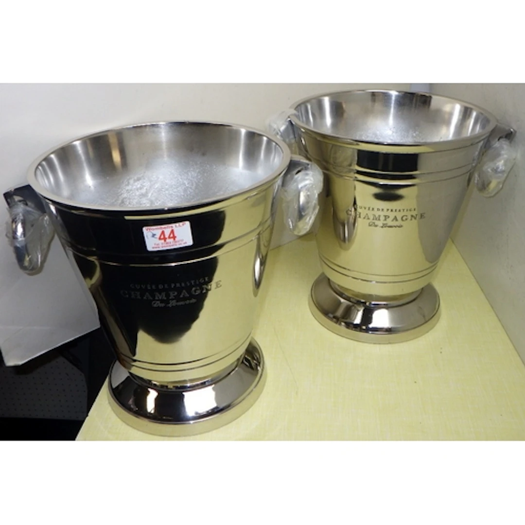 A pair of plated Champagne buckets, 28cm tall