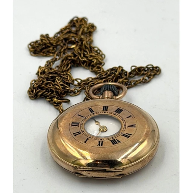 A 9ct gold Ladies half hunter pocket watch (Approximate weig...