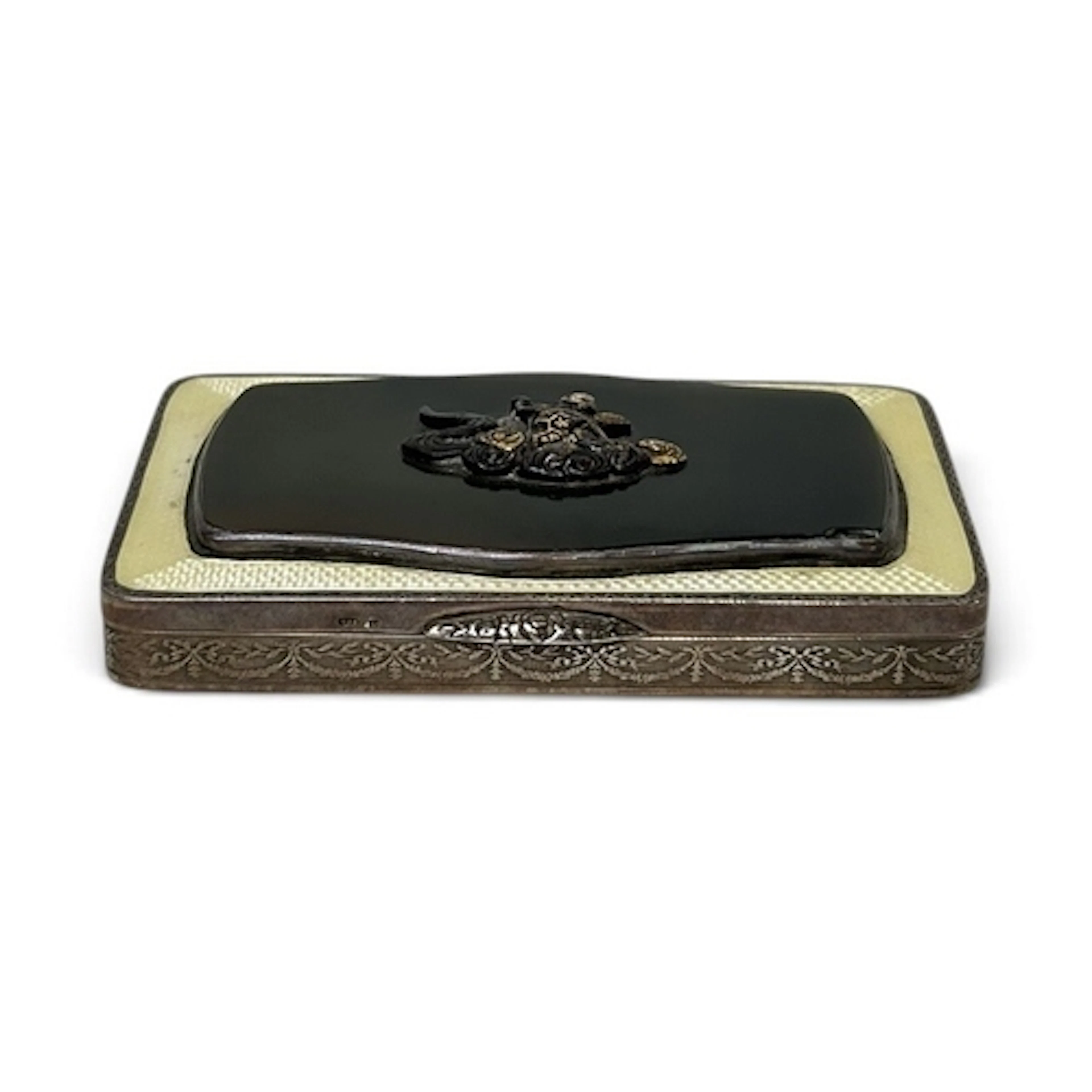 A JAPANESE SILVER AND SHAKUDO CIGARETTE BOX 9cm Width...