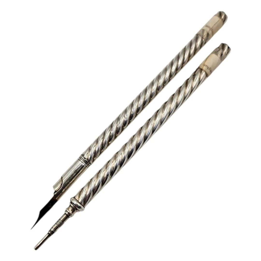 A VICTORIAN SILVER FOUNTAIN PEN AND PENCIL SET Having Wyther...