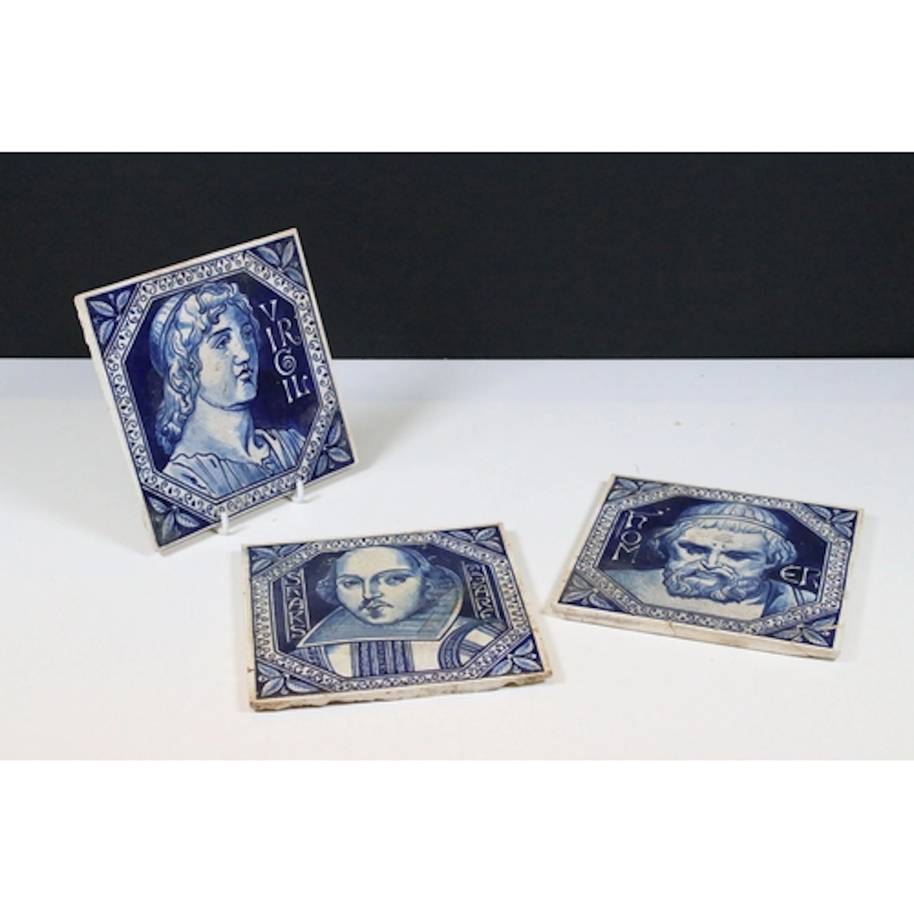 Three W. B. Simpson & Sons hand-painted tiles of literary fi...