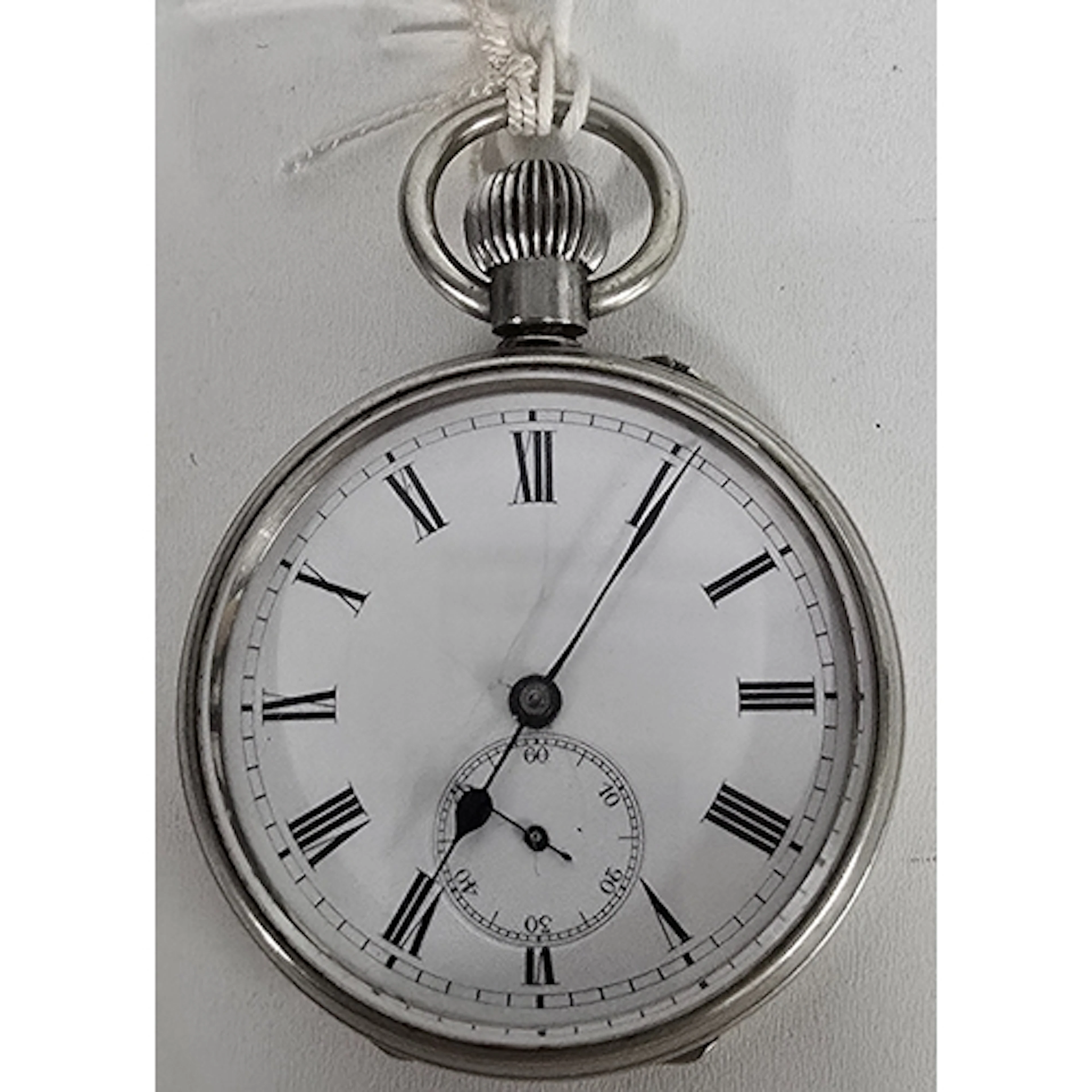 A Swiss made pocket watch by "Maxim", circa 1910, the back e...