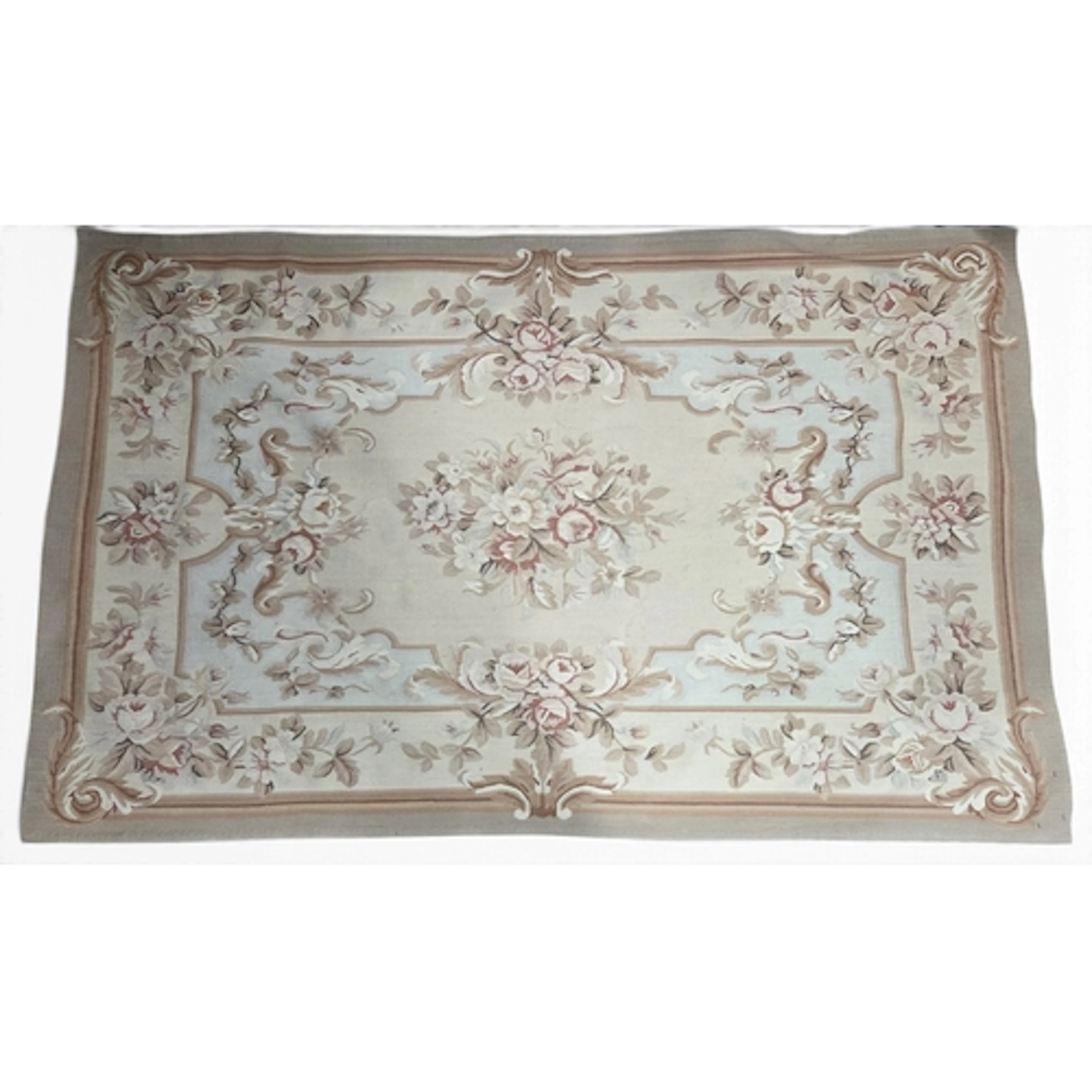 A good Cream ground Aubuson style Rug with floral design. 12...