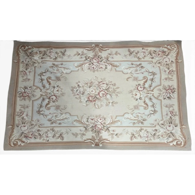 A good Cream ground Aubuson style Rug with floral design. 12...