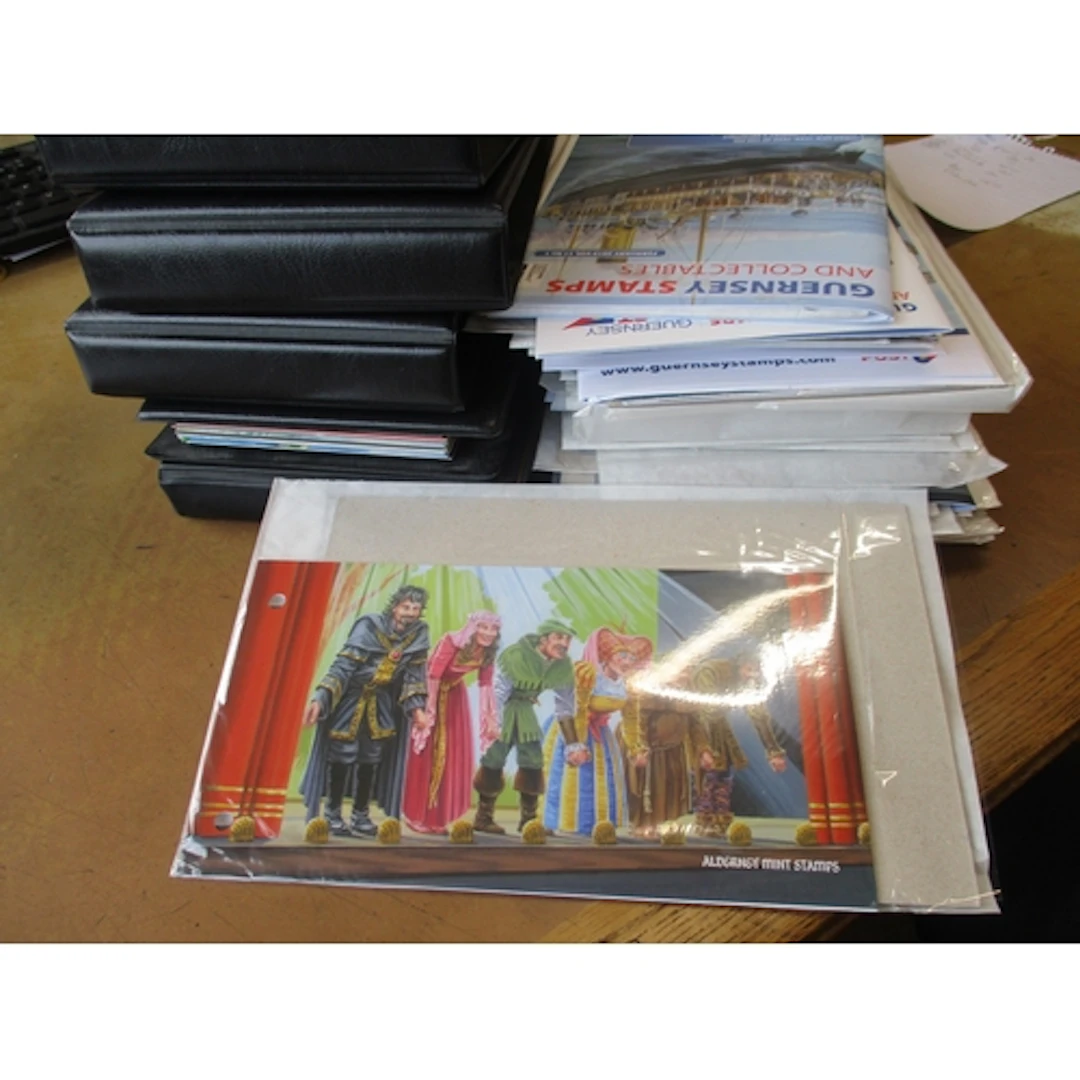 World misc accum in approx 16 vols and loose, incl Guernsey ...