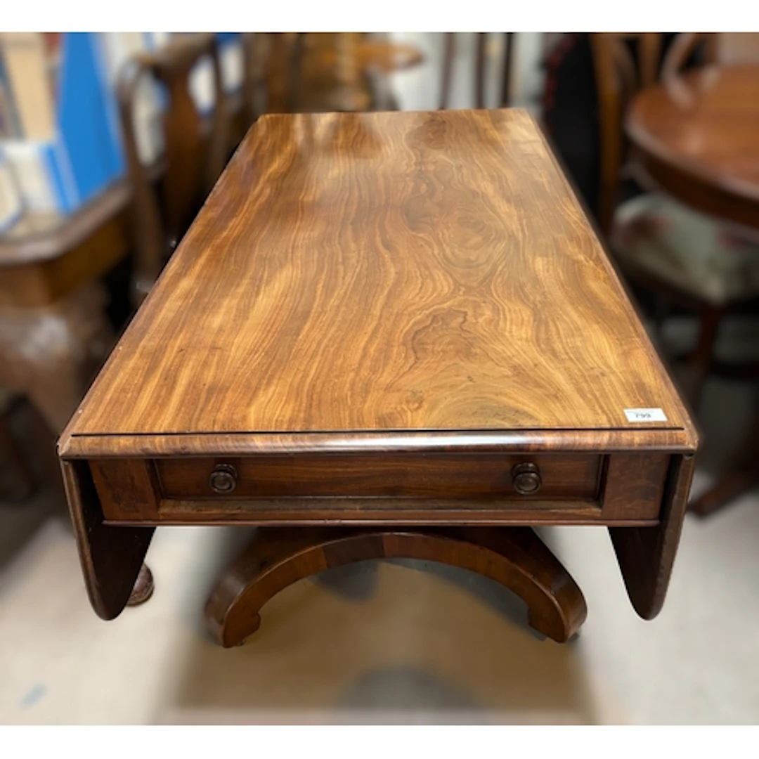 An oversize Cuban mahogany Pembroke table with one piece top...