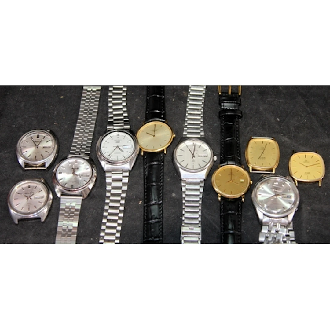 A collection of Gents dress watches by Omega, Seiko and Long...