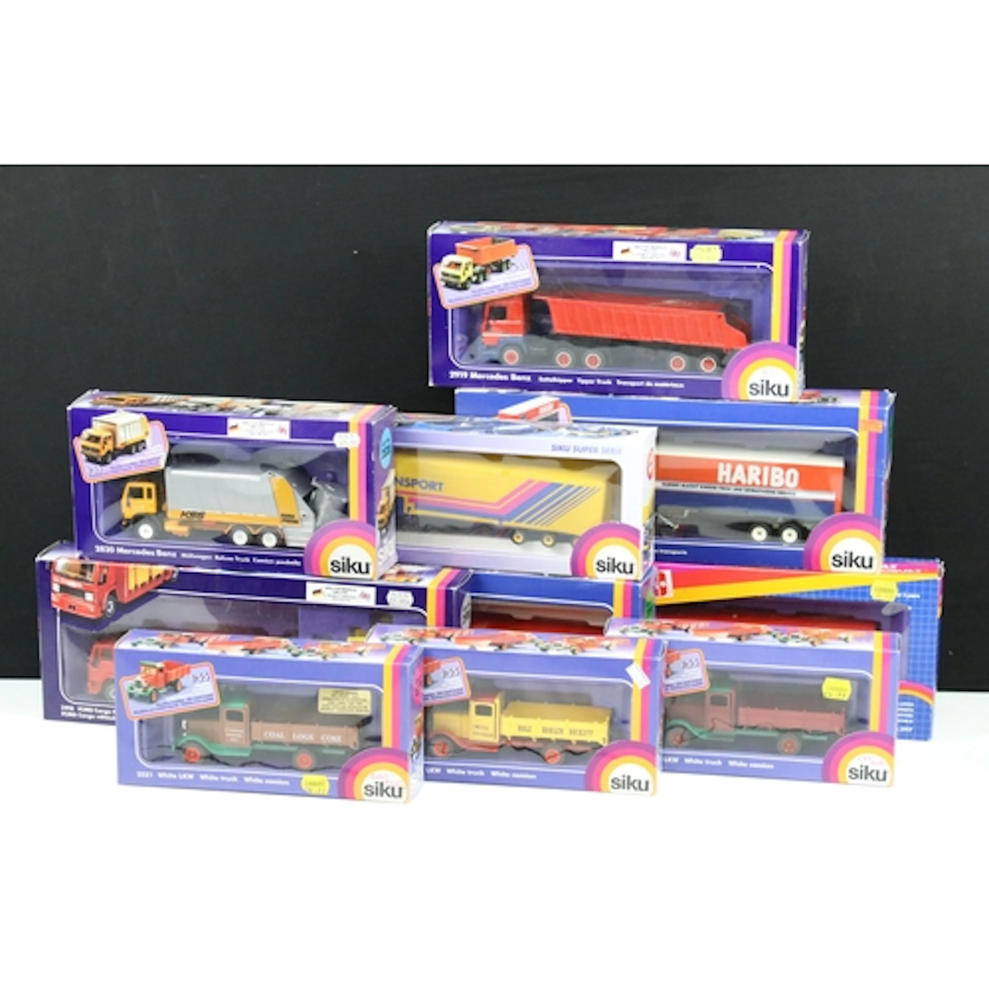 Ten boxed Siku haulage and commercial related diecast models...