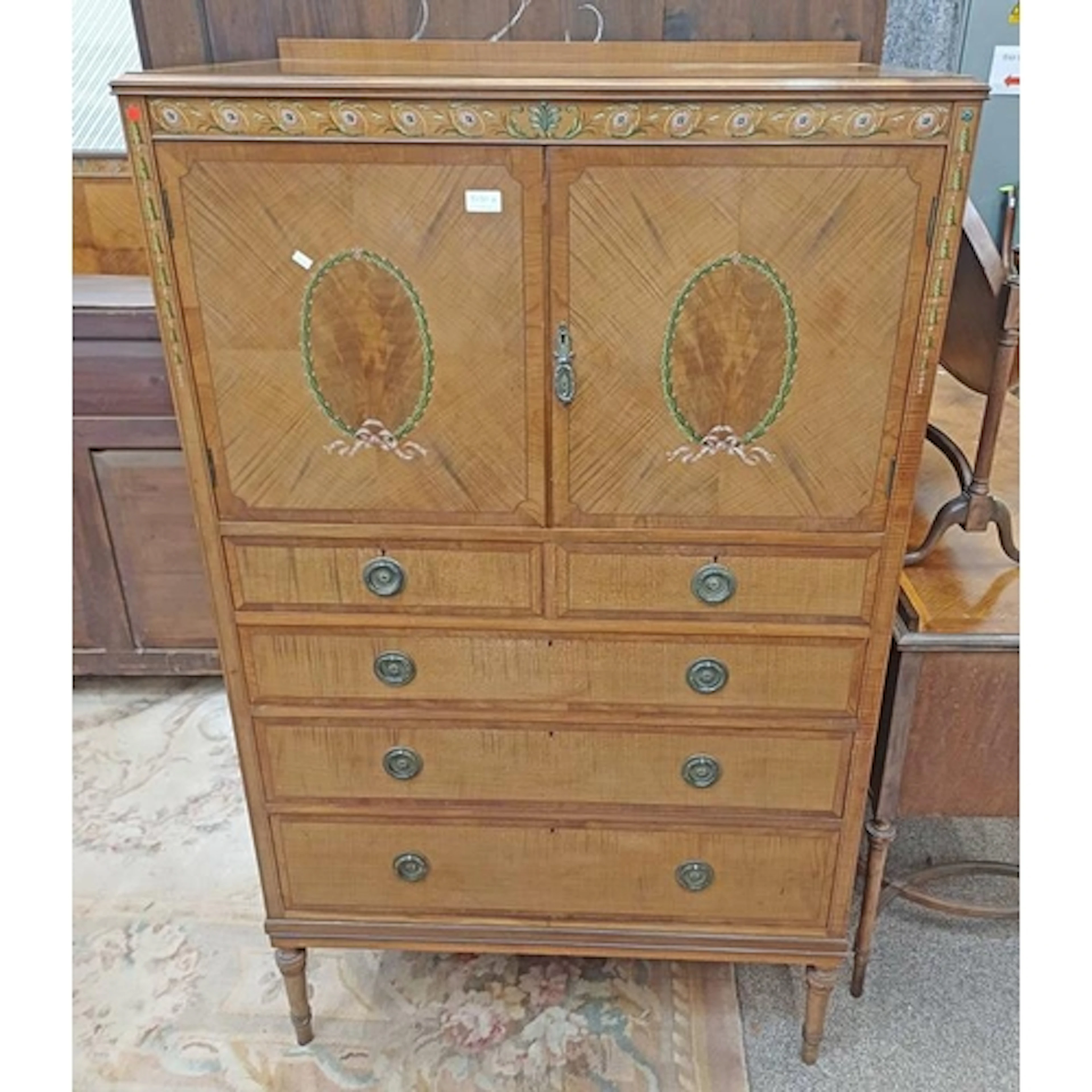 REGENCY STYLE SATIN TALL BOY WITH OVERALL PAINTED DECORATION...