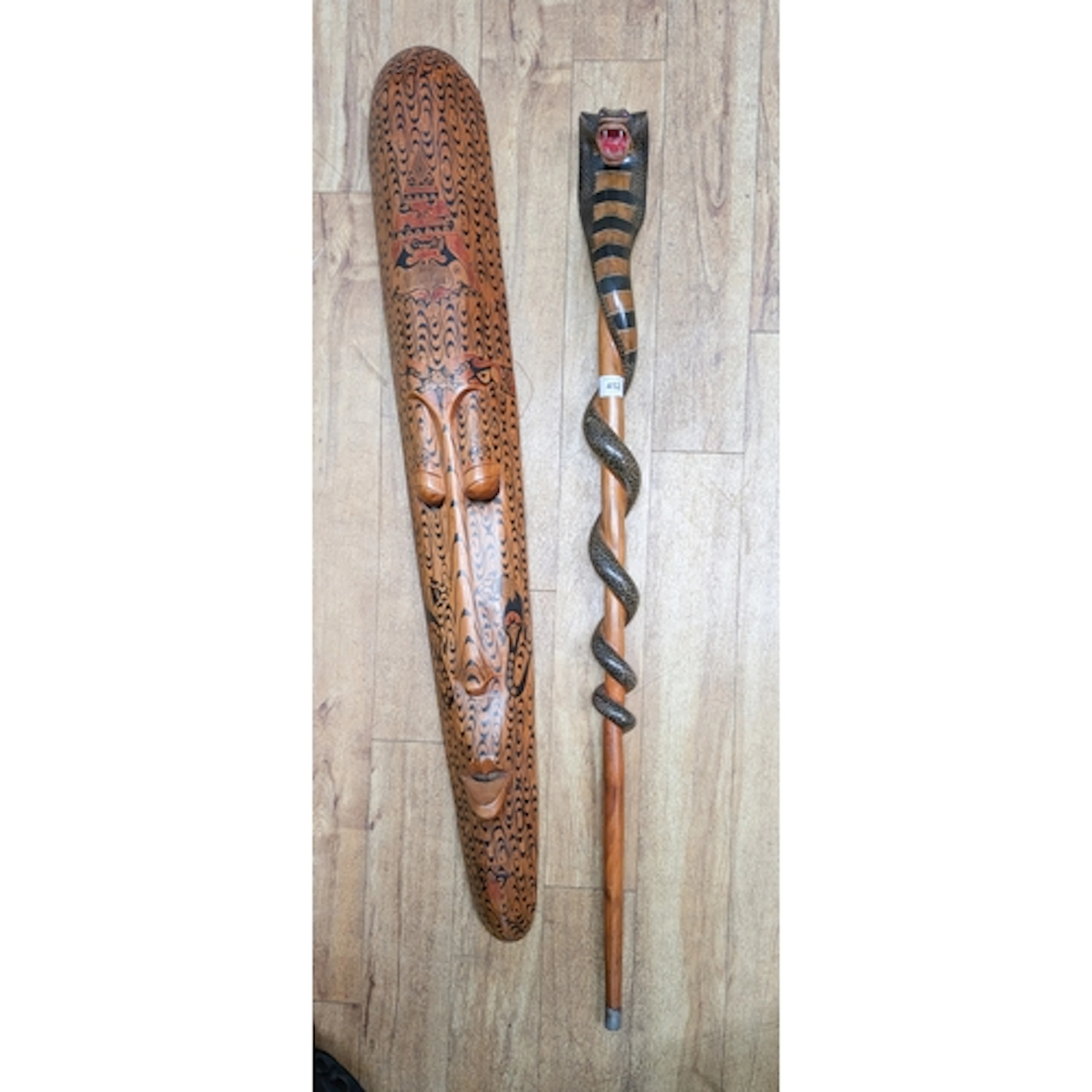 An unusual carved cobra walking stick together with a large ...