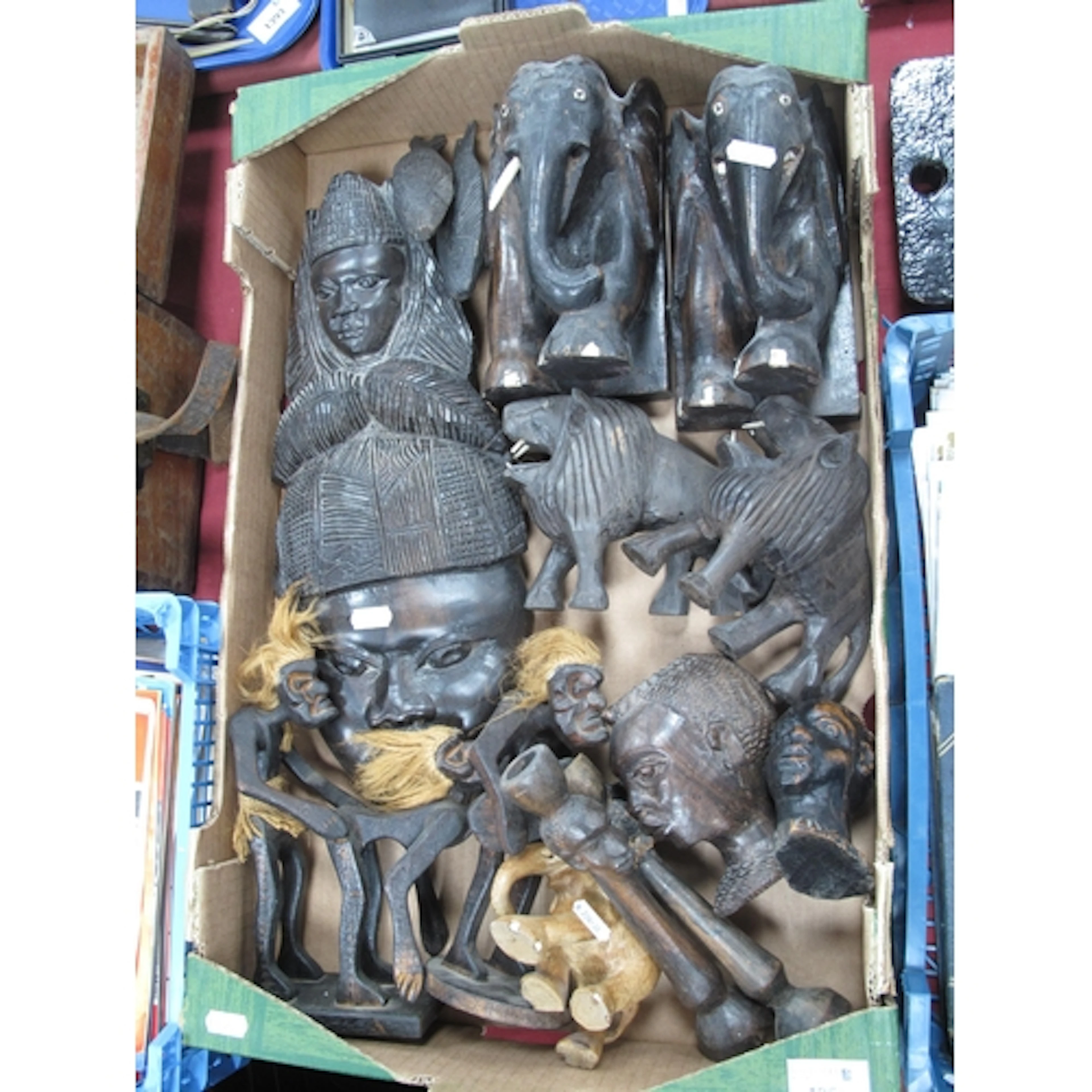 Collection of 20th-century carved tribal wooden items, inclu...