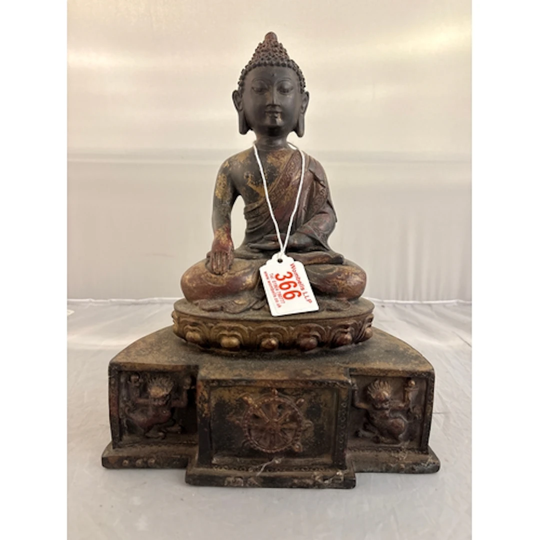 A cast bronze Buddha 29cm tall