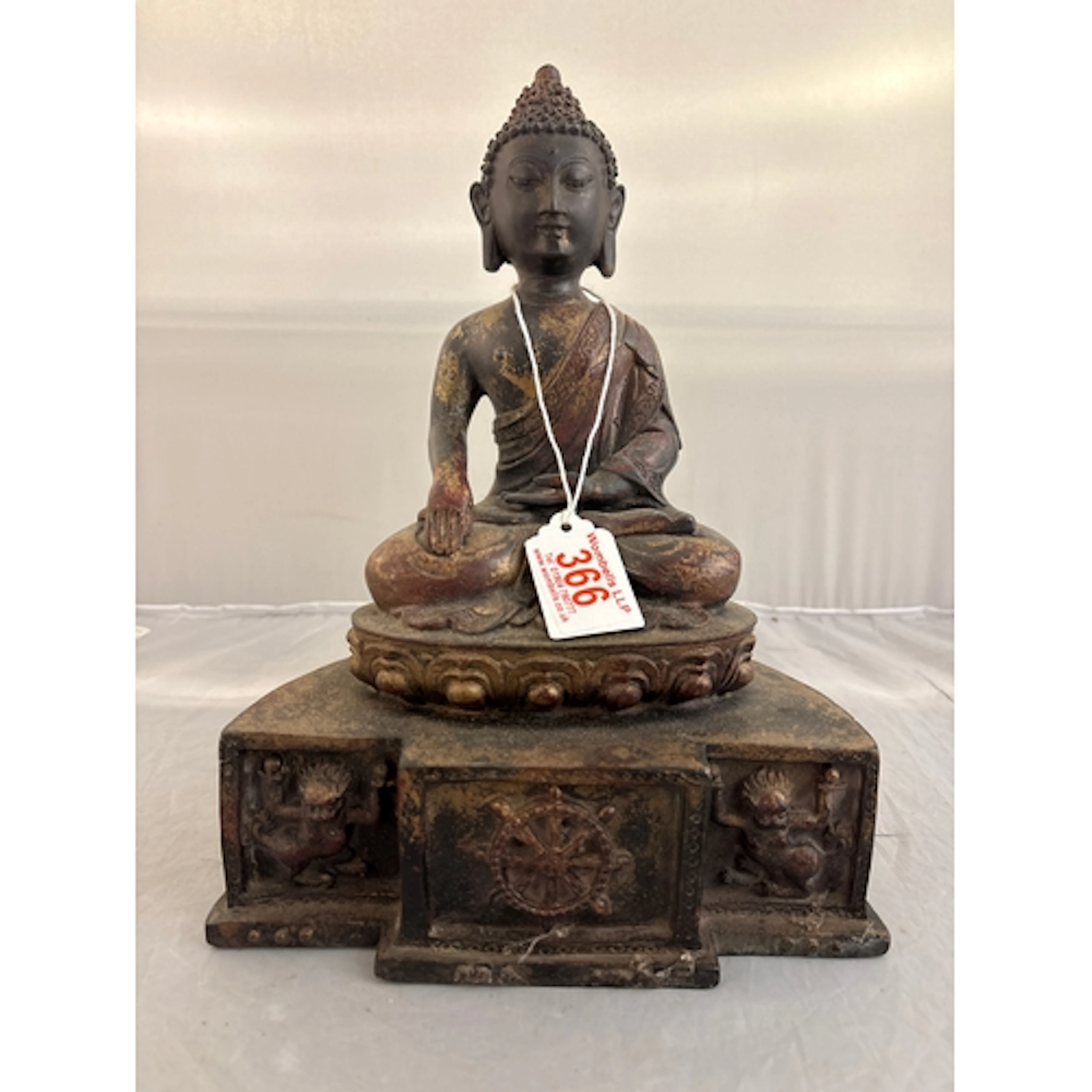 A cast bronze Buddha 29cm tall