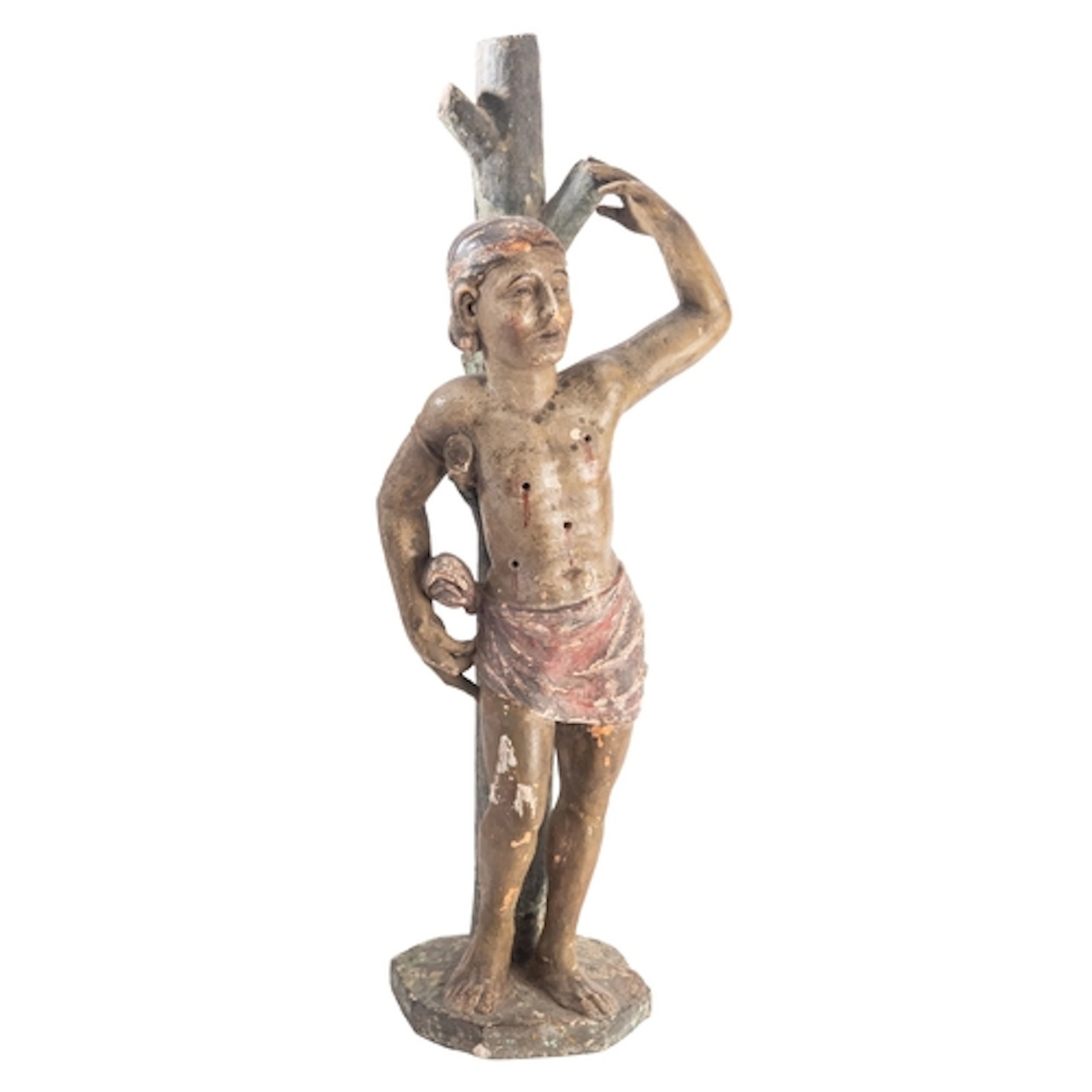 A Continental provincial painted stone model of Saint Sebast...