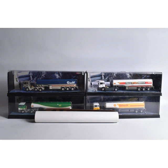 FOUR CORGI 1:50 SCALE DIECAST MODERN TRUCKS IN ERF SHOW CASE...