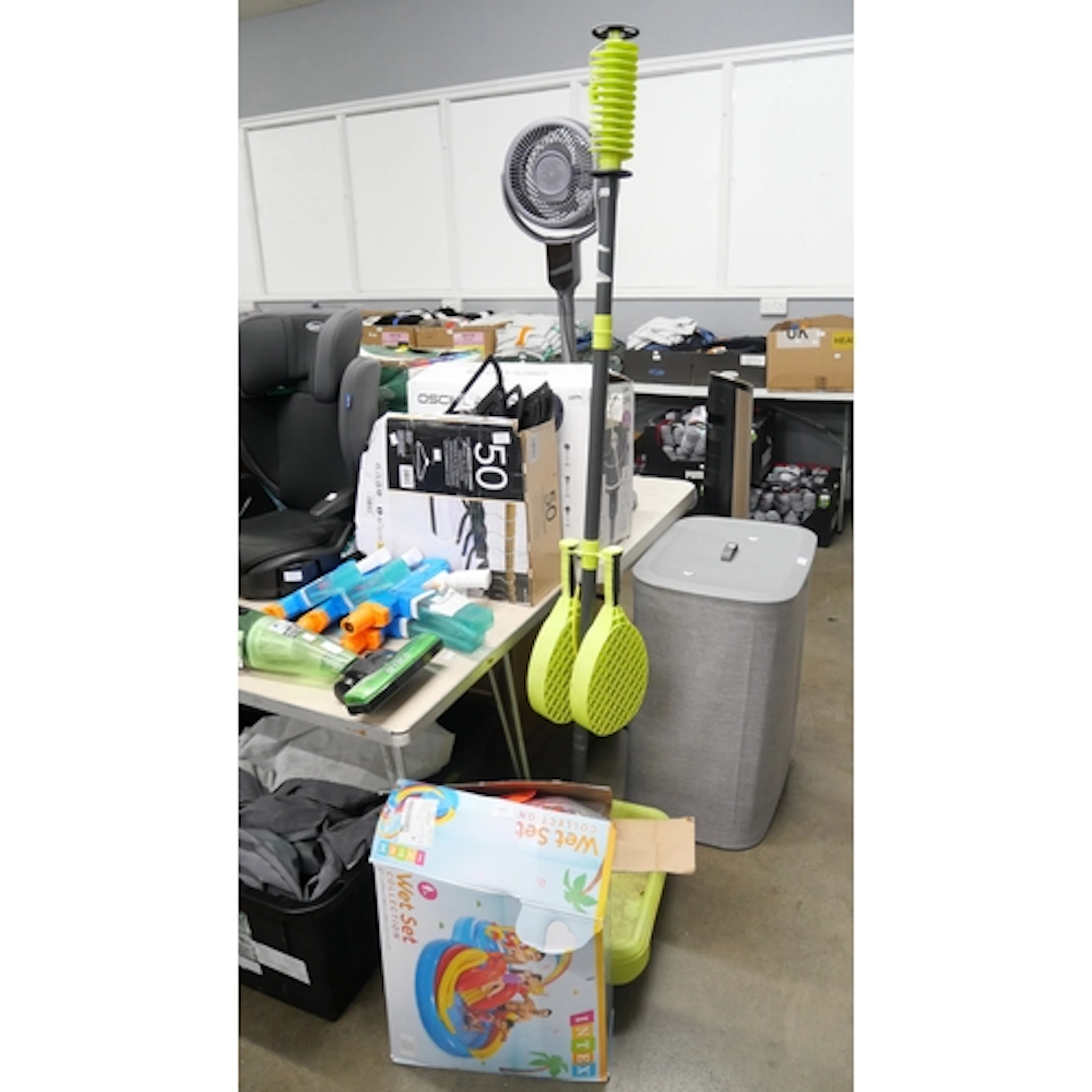 An Intex rainbow ring playcentre and a Swingball All Surface...