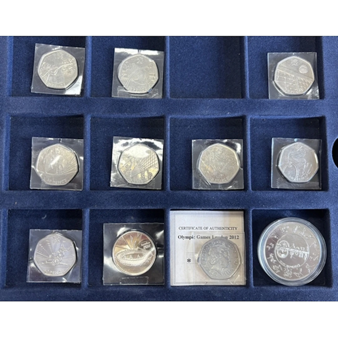 Collection in two Westminster of mostly uncirculated CuNi is...