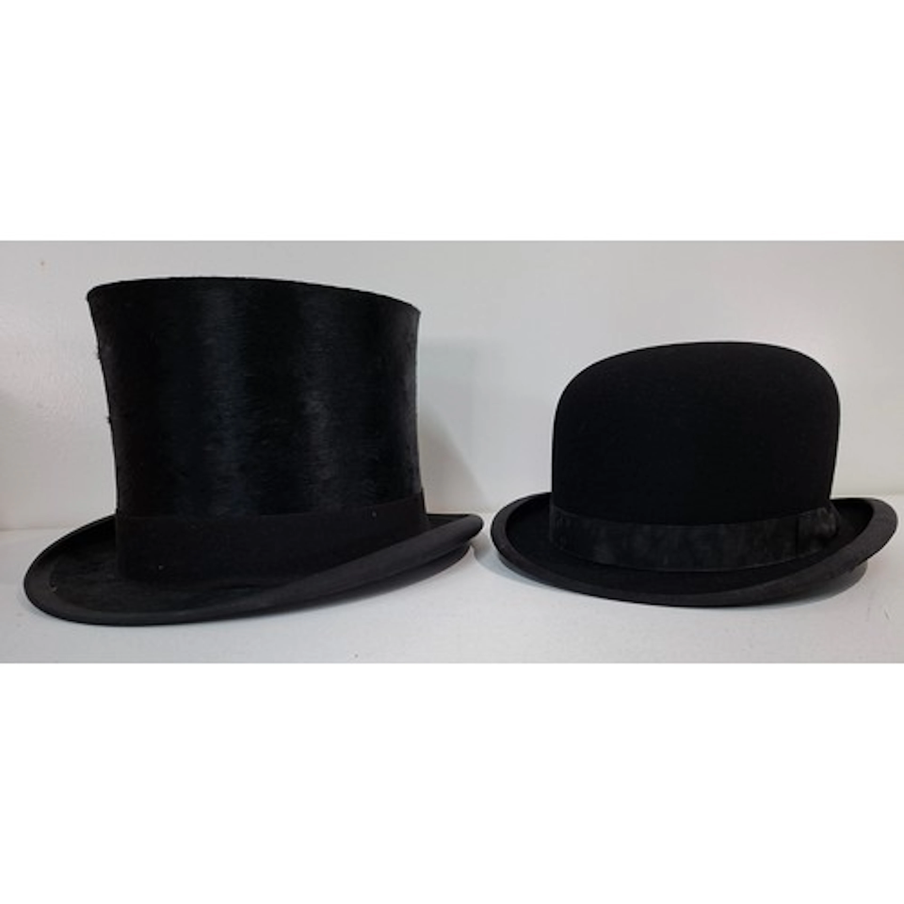 A vintage Harman & Son black silk felt top hat approx 57cm i...