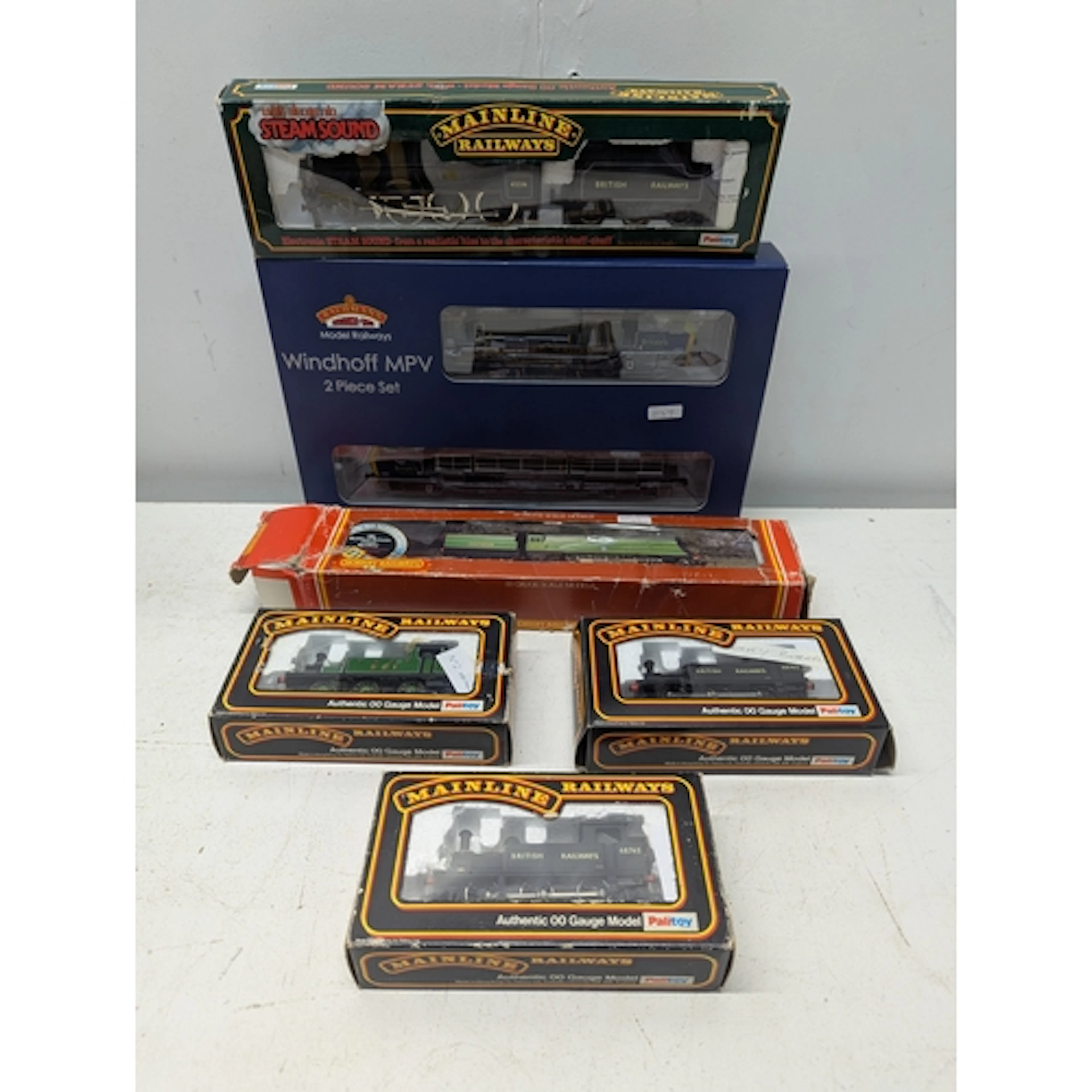 Mixed model trains to include a Mainline "Private W Wood V.C...