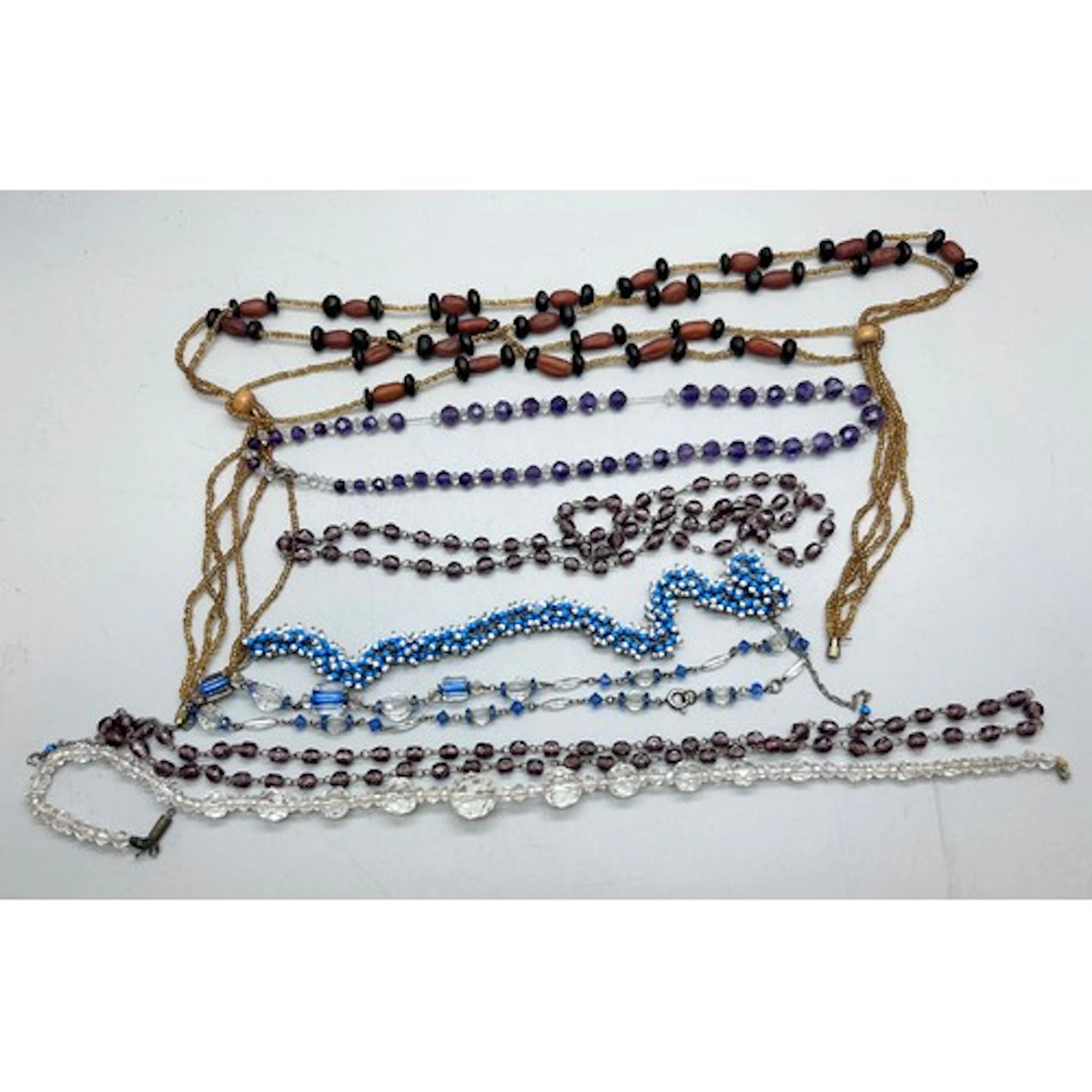 A collection of vintage necklaces including Art Deco, some a...