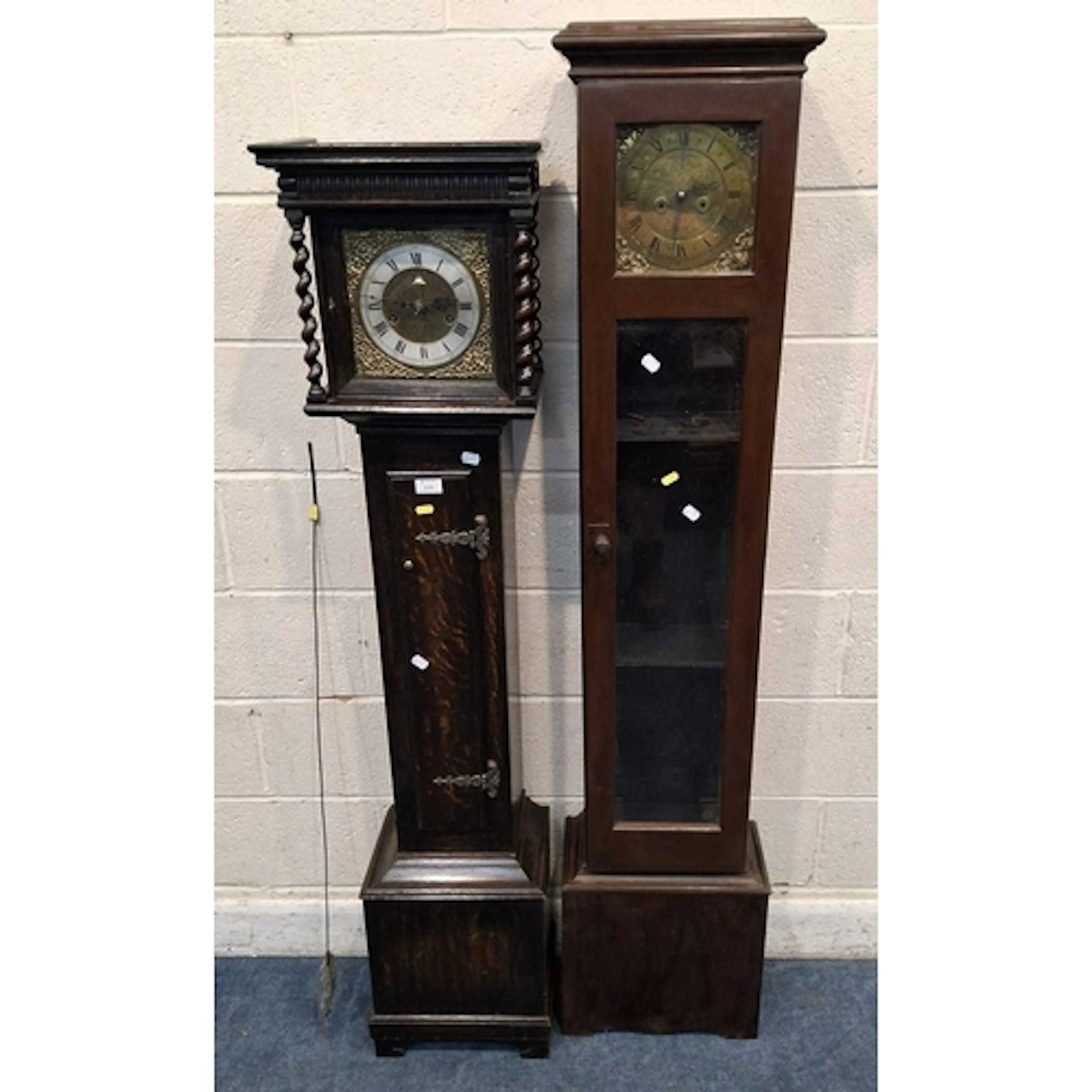 A 20TH CENTURY OAK CASED GRANDDAUGHTER CLOCK, the glass door...