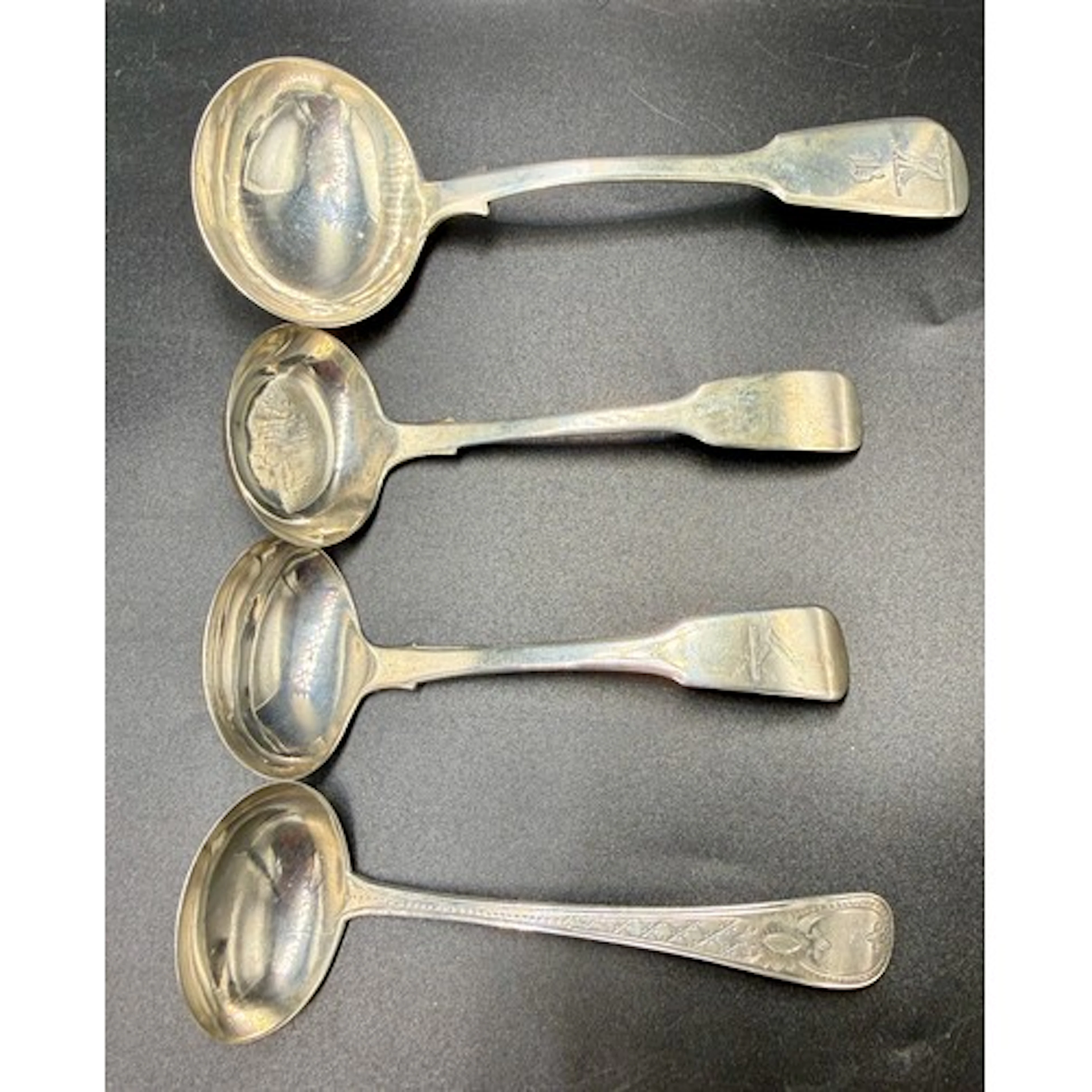 Four Exeter silver ladles to include Edwin Sweet 1835, Josep...