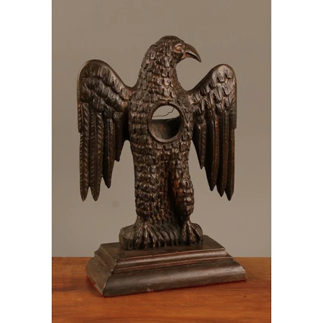 A 19th century Baroque softwood pocket watch stand, carved a...