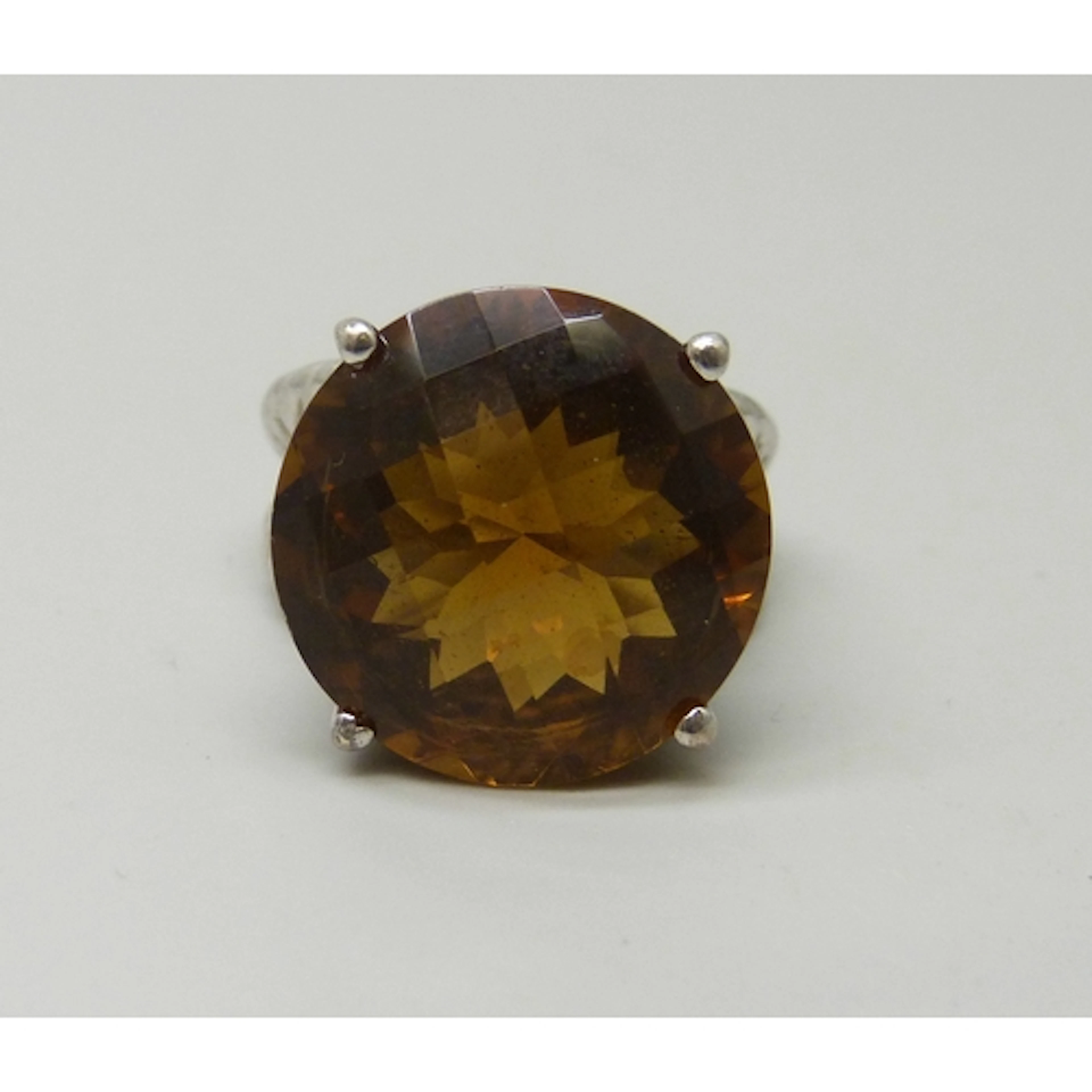 A statement TGGC silver and checker board cut citrine ring, ...