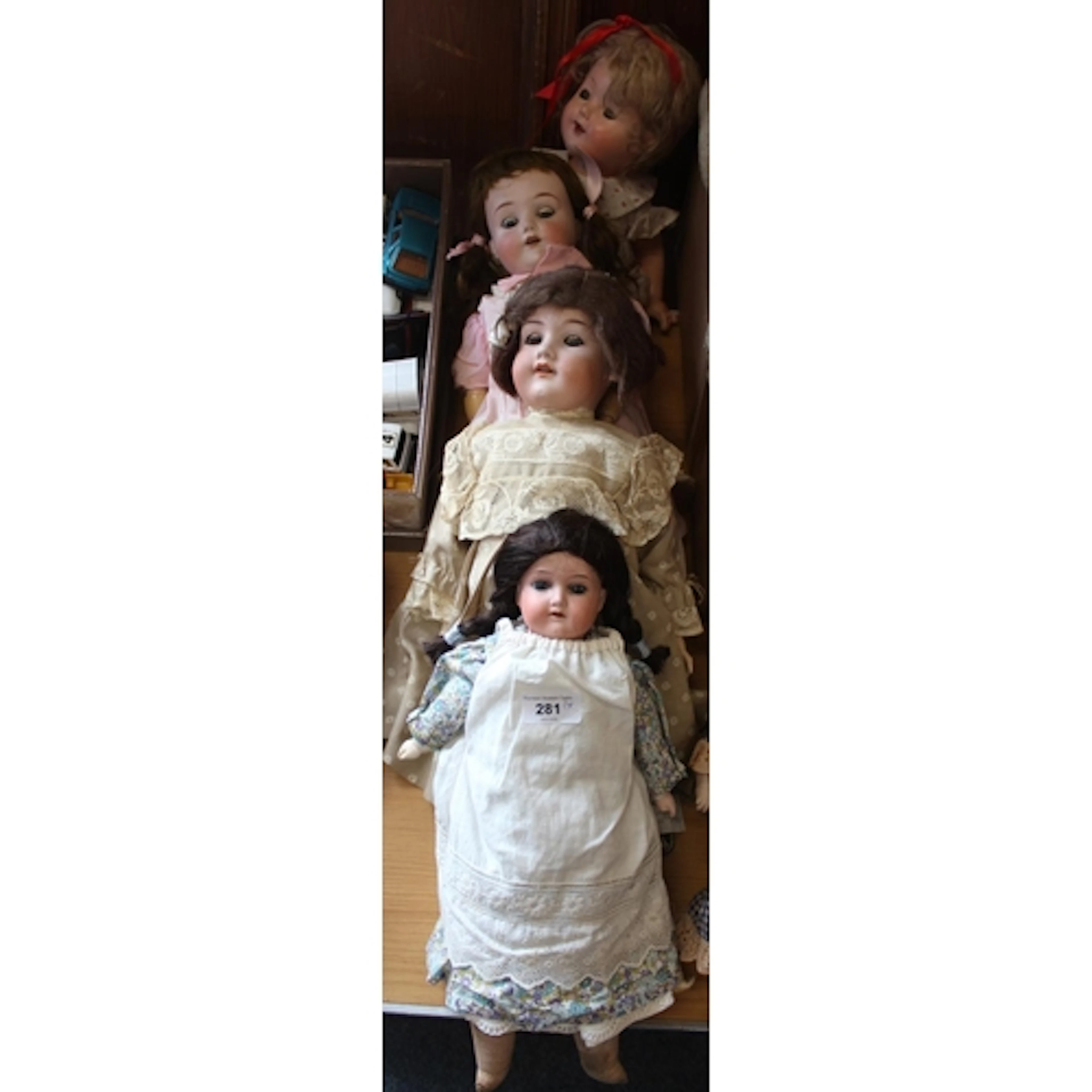 Three vintage bisque porcelain headed dolls to include Arman...