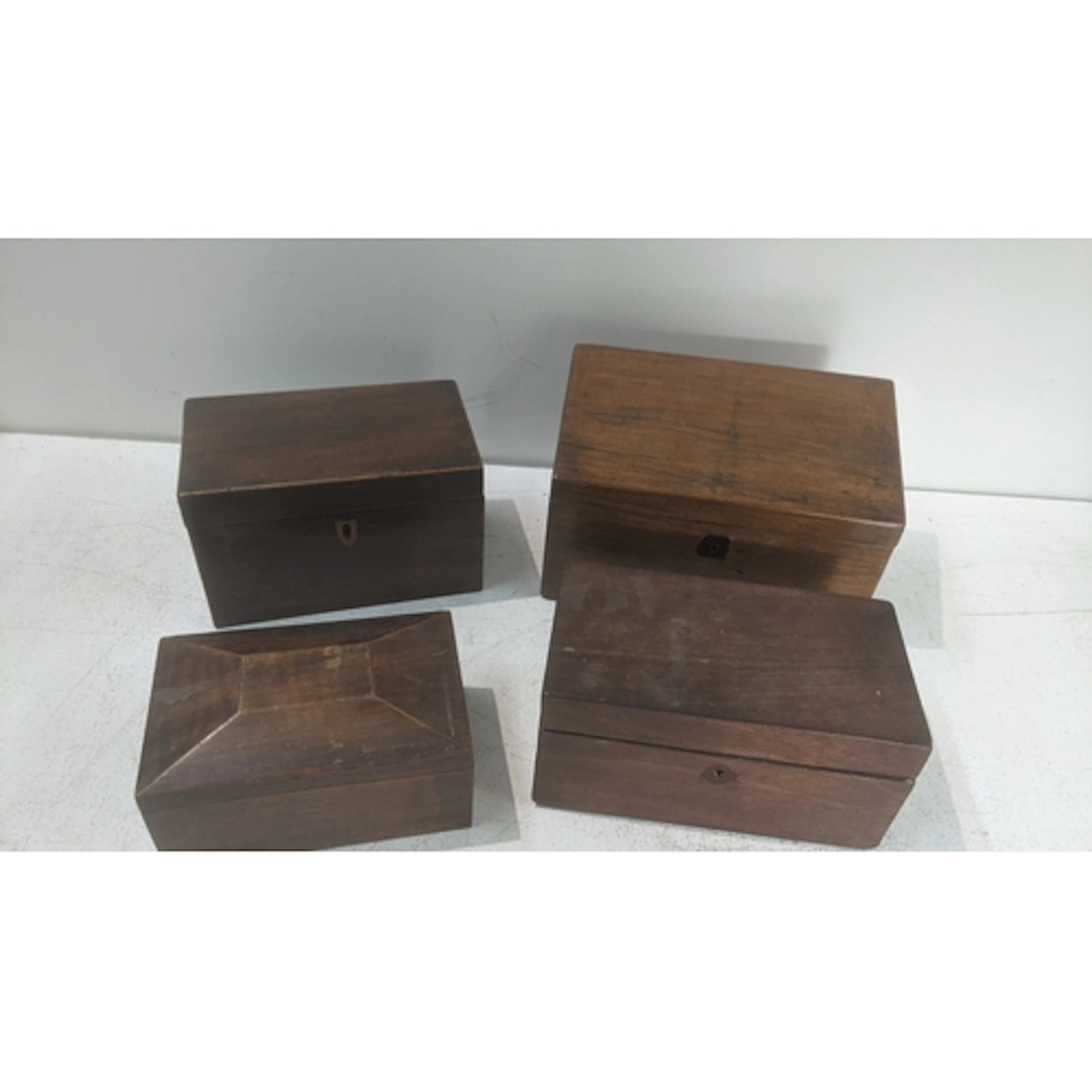 Four vintage storage boxes to include Victorian mahogany te...