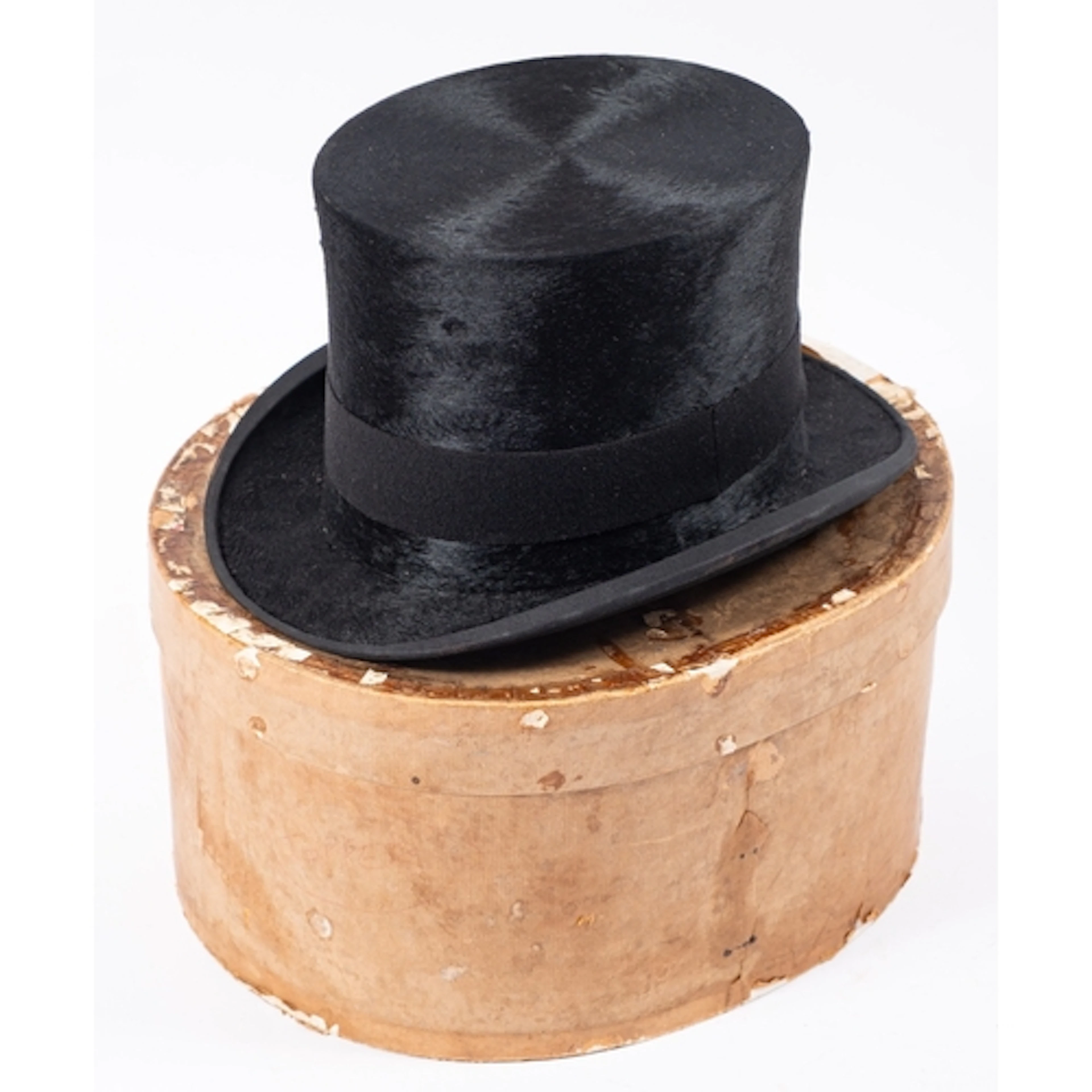 An early 20th Century Garrard Hats for Austin Reed black top...