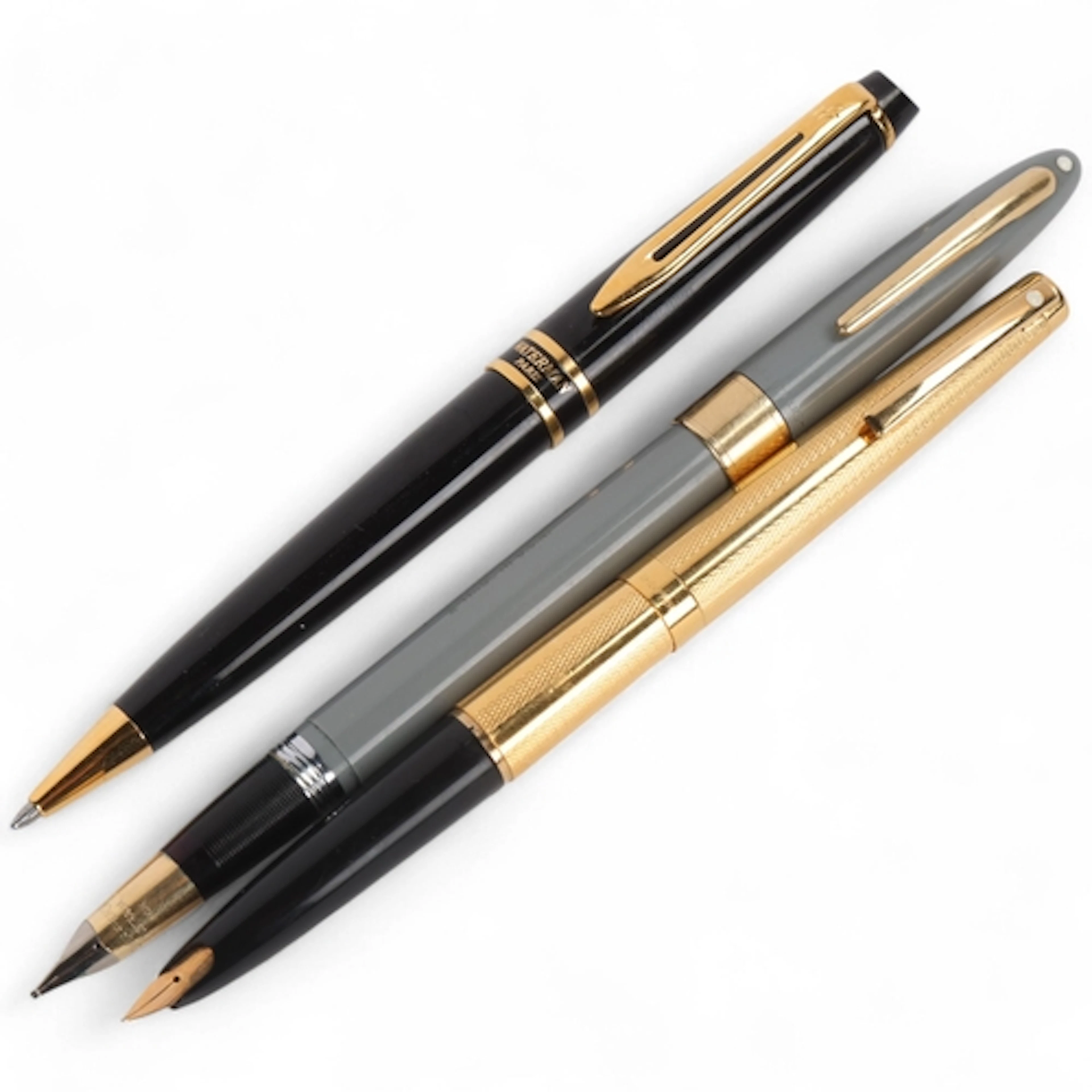2 vintage Sheaffer fountain pens, a grey bodied "snorkel" fi...