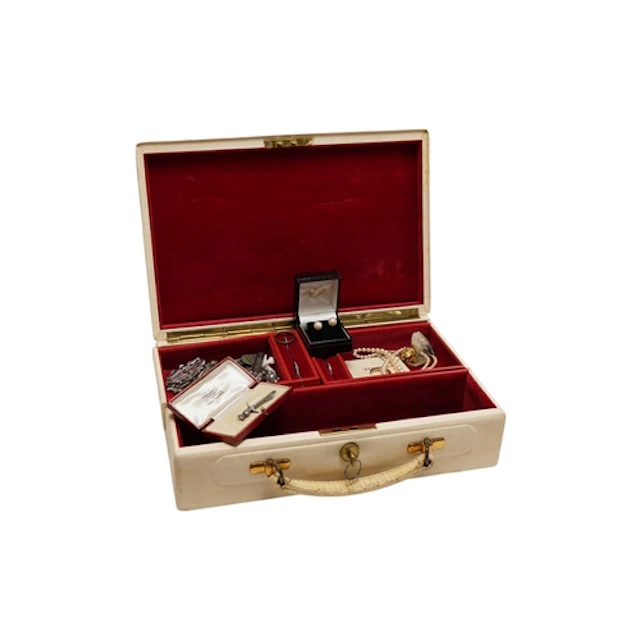A jewellery box containing assorted jewellery and other item...