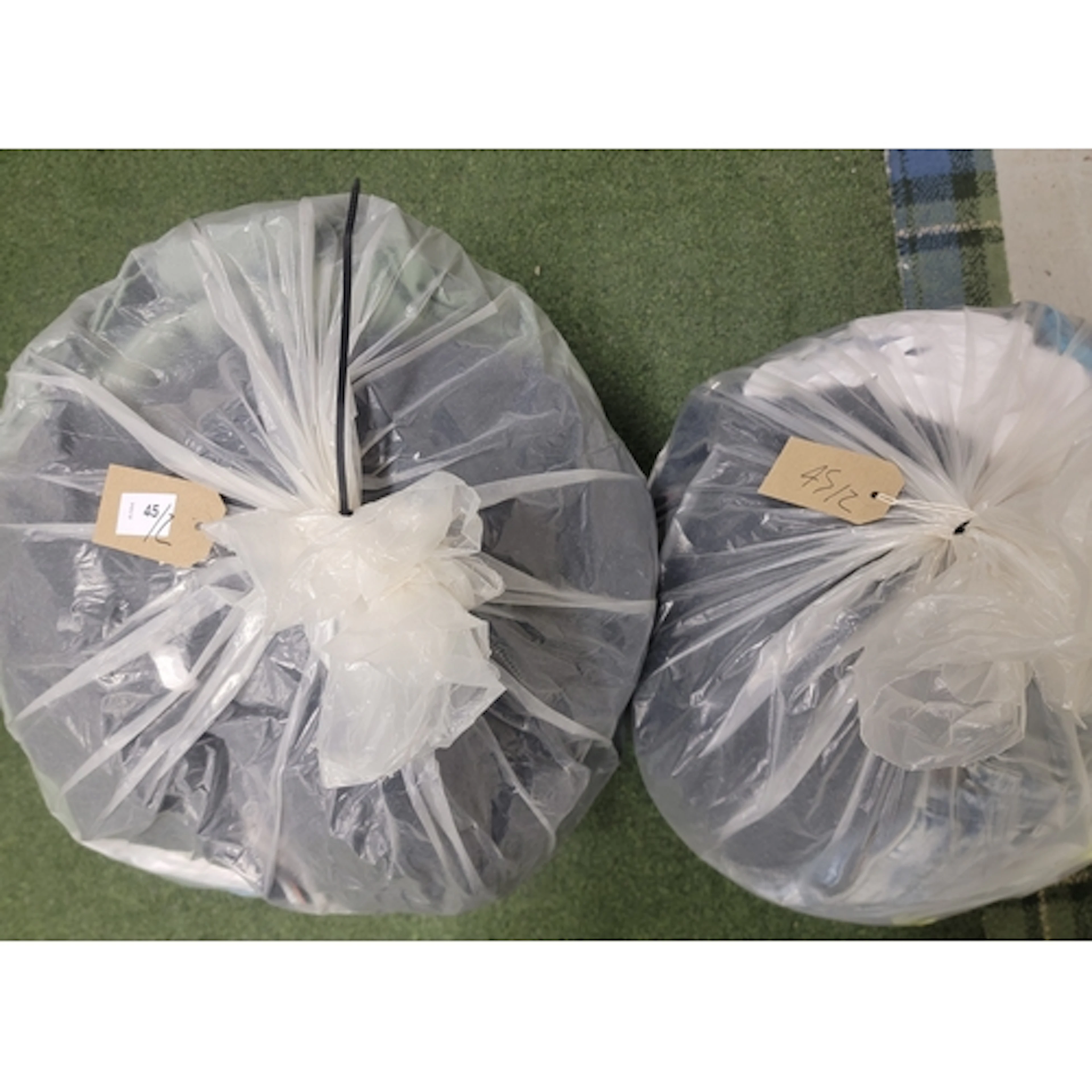 TWO BAGS OF GENTS CLOTHING ITEMS including: M&S, Wrangler, S...