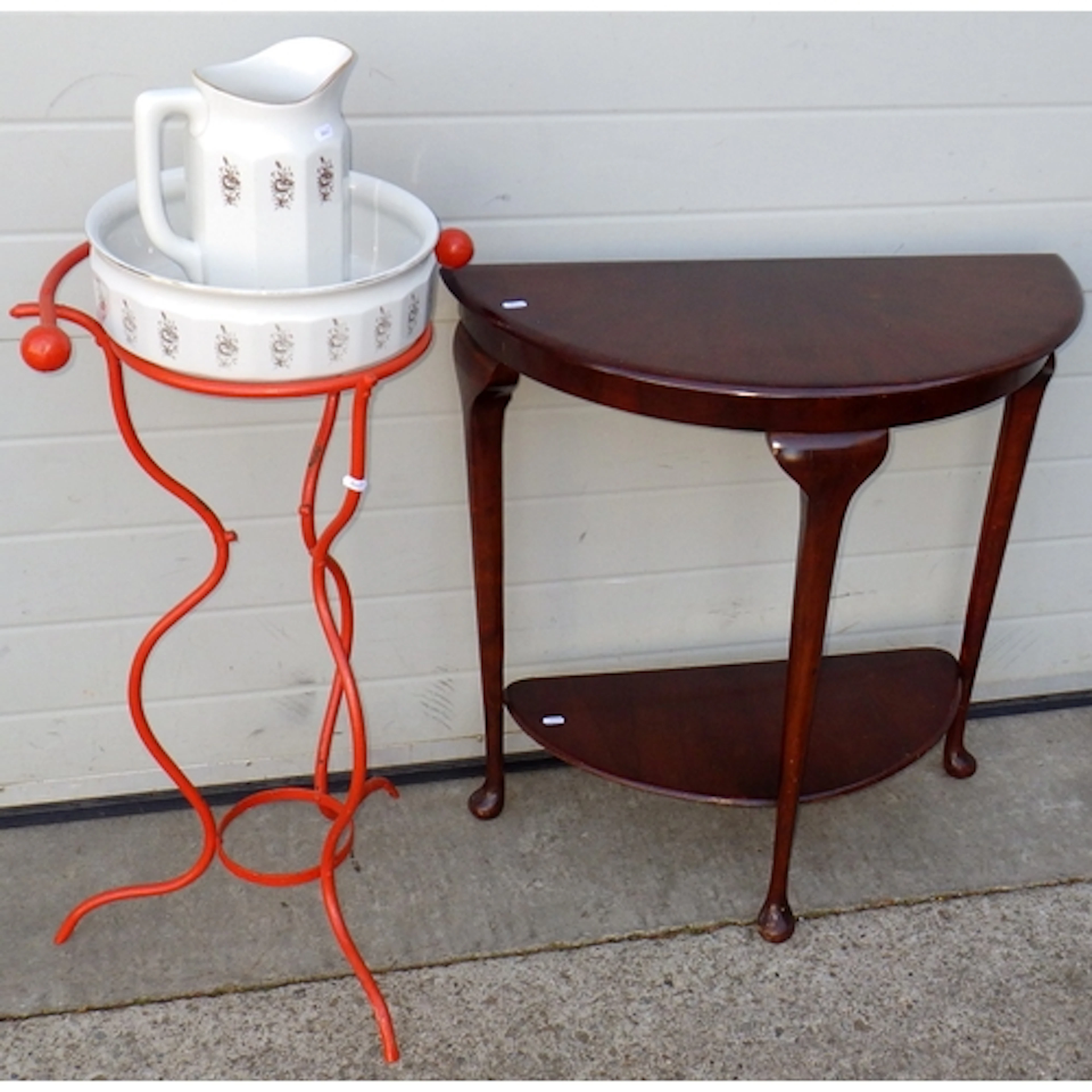 A metal bowl stand together with a ceramic jug & bowl togeth...
