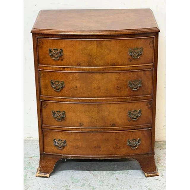 Bow fronted chest of drawers on bracket feet