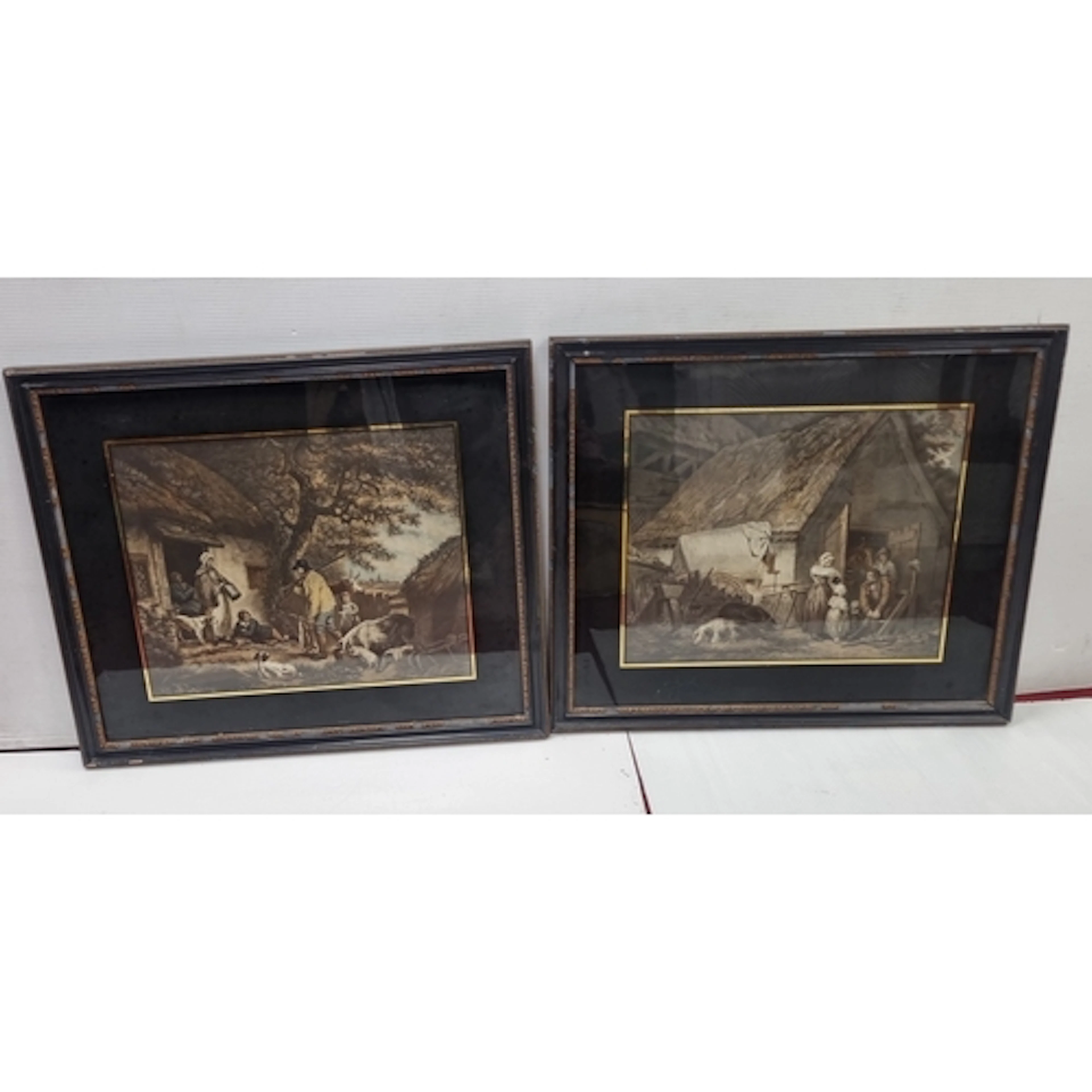 pair of framed coloured genre prints - rural village scene p...