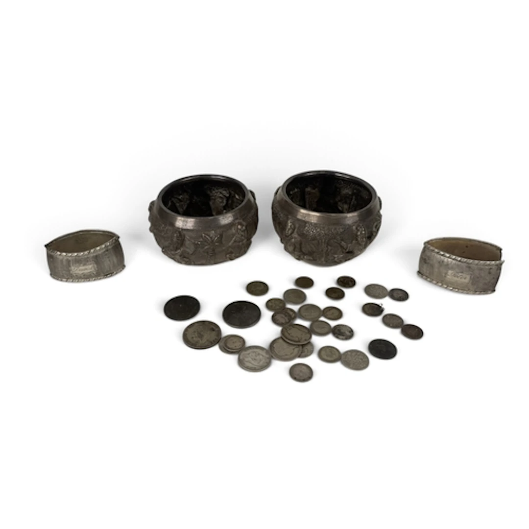 TWO SOUTHEAST ASIAN SILVER BOWLS TOGETHER WITH TWO NAPKIN RI...