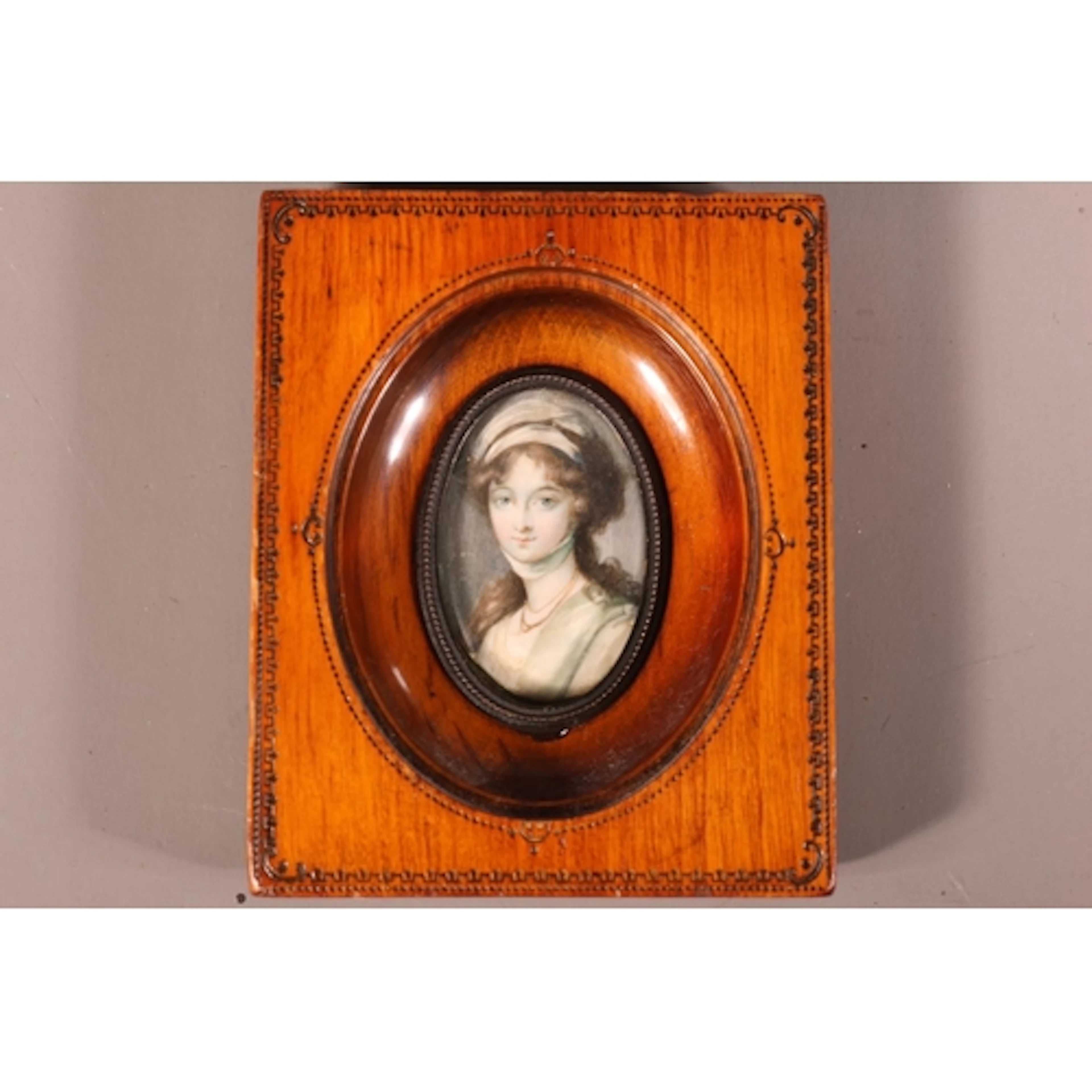 19TH CENTURY SCHOOL Bust length portrait of a young woman ...