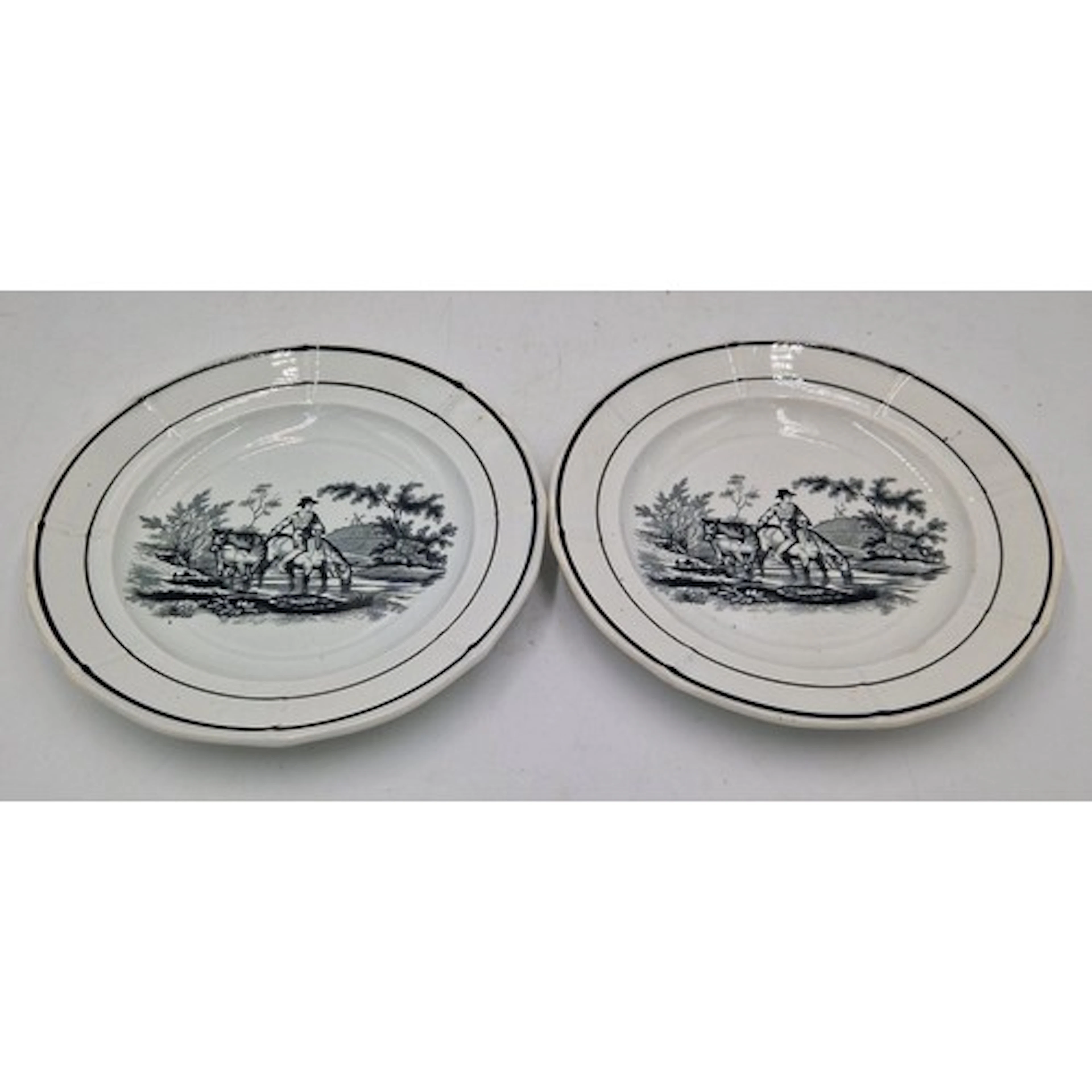 Two early 19th century black and white transfer printed Swan...