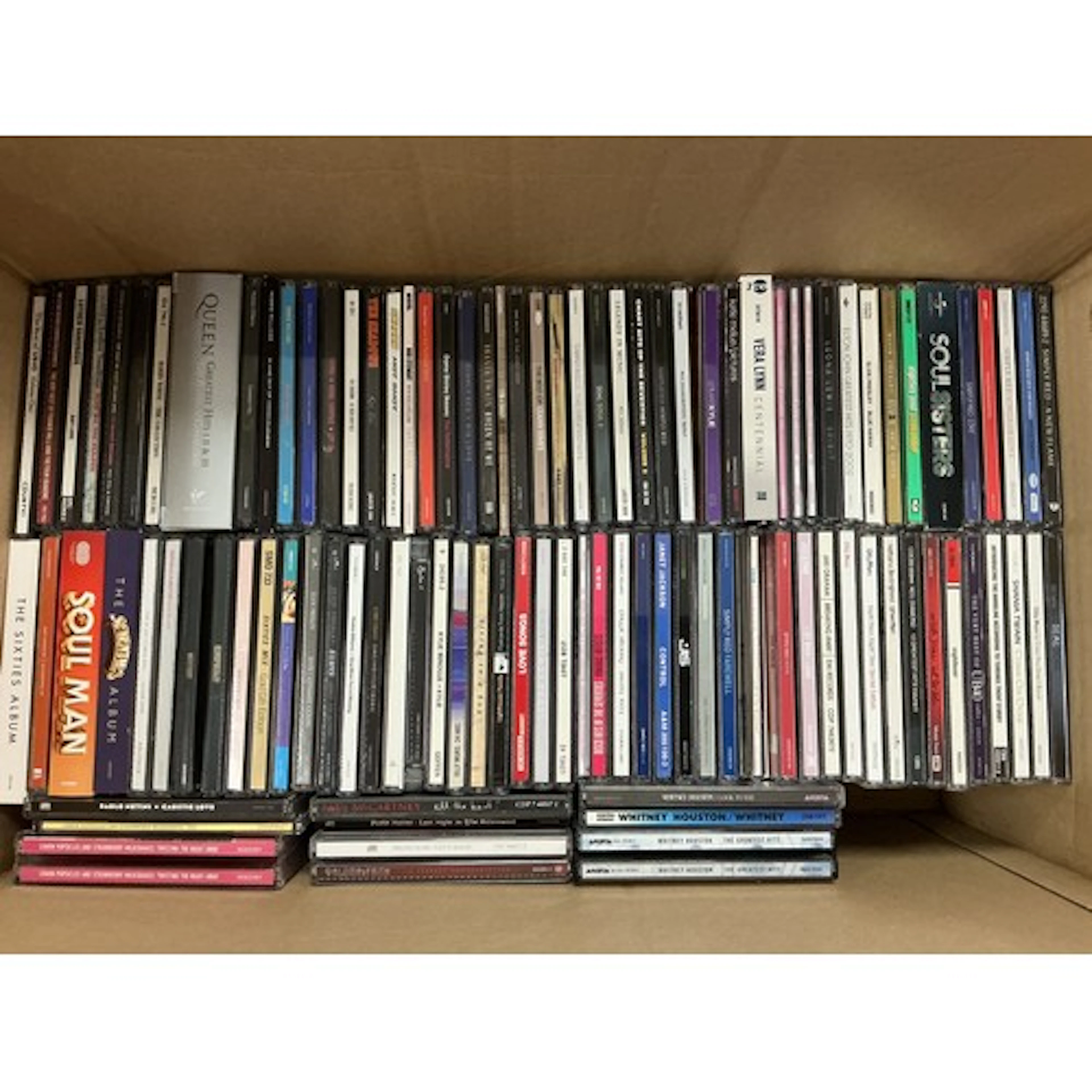 Two boxes of CDs by various artists including The Beatles, E...