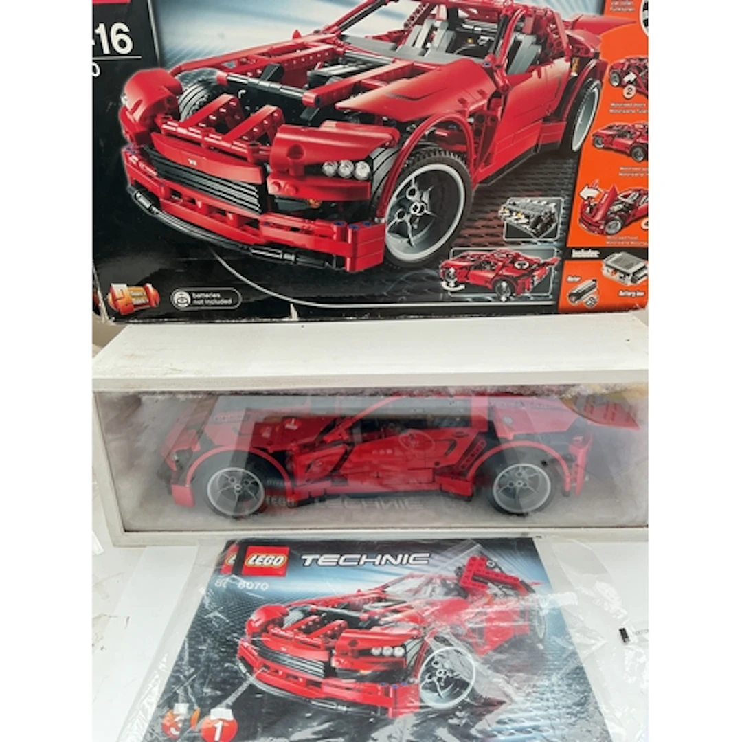 A Lego Technic Red Super Car In Display Case With Box And In...