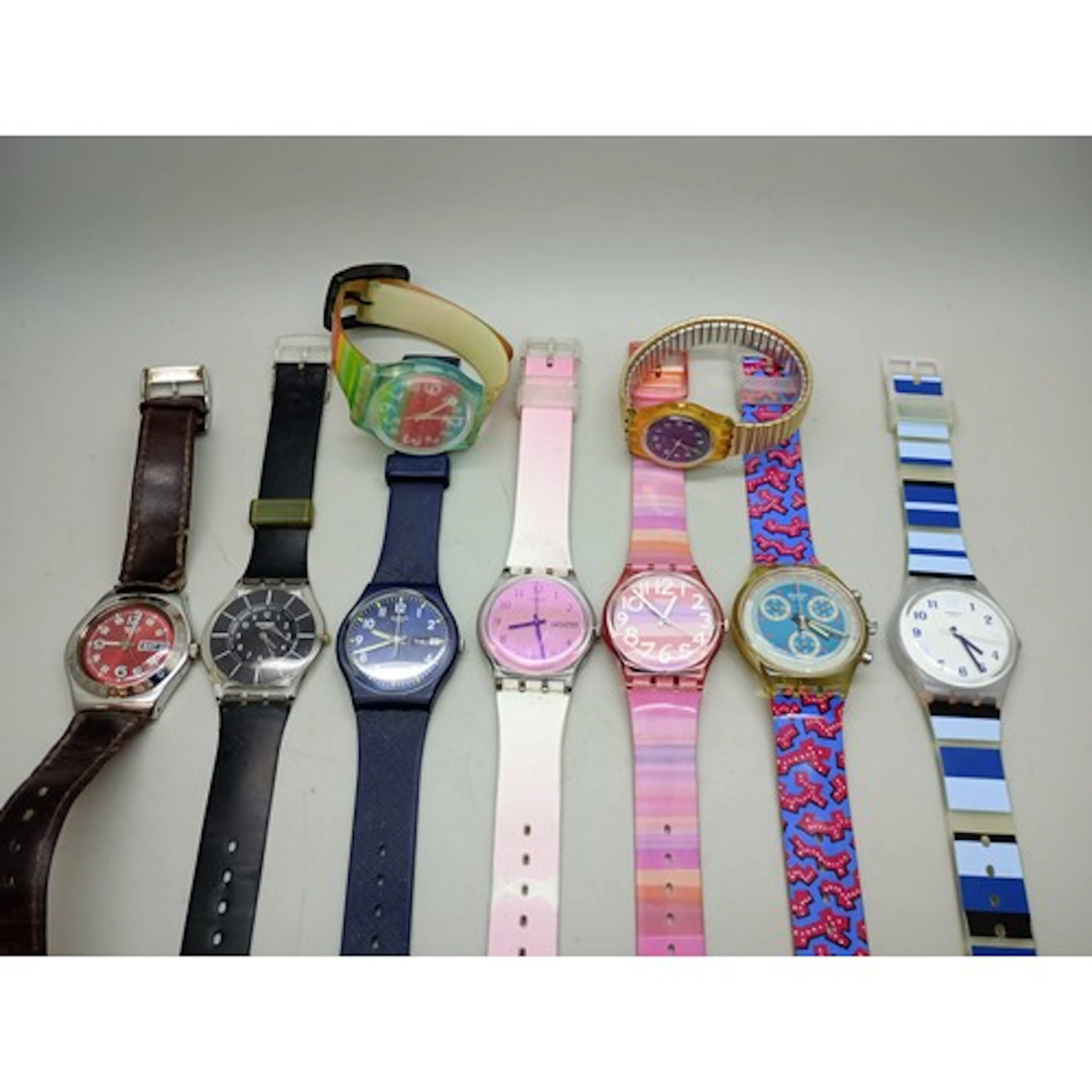 A collection of Swatch wristwatches