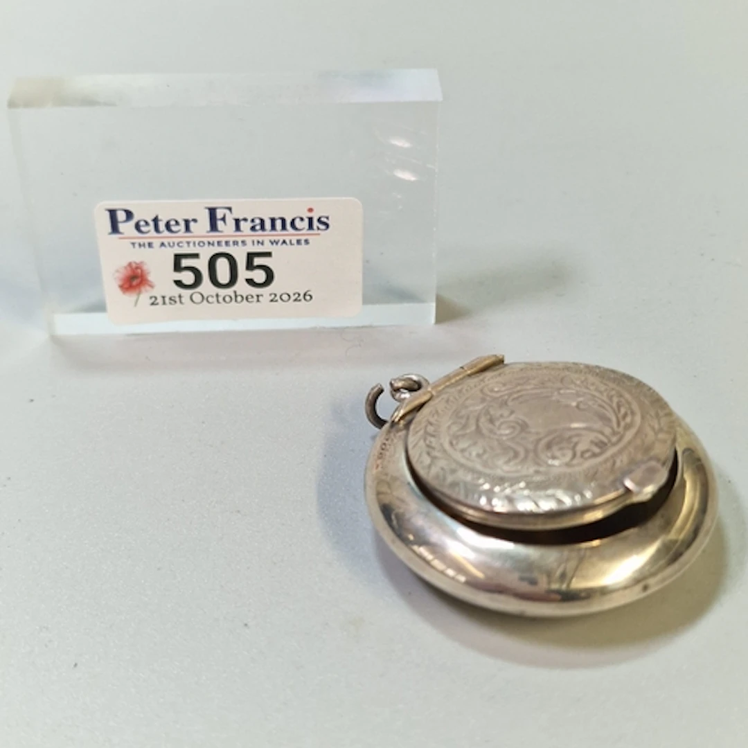 George V silver ornate engraved snuff box, of pebble form, b...