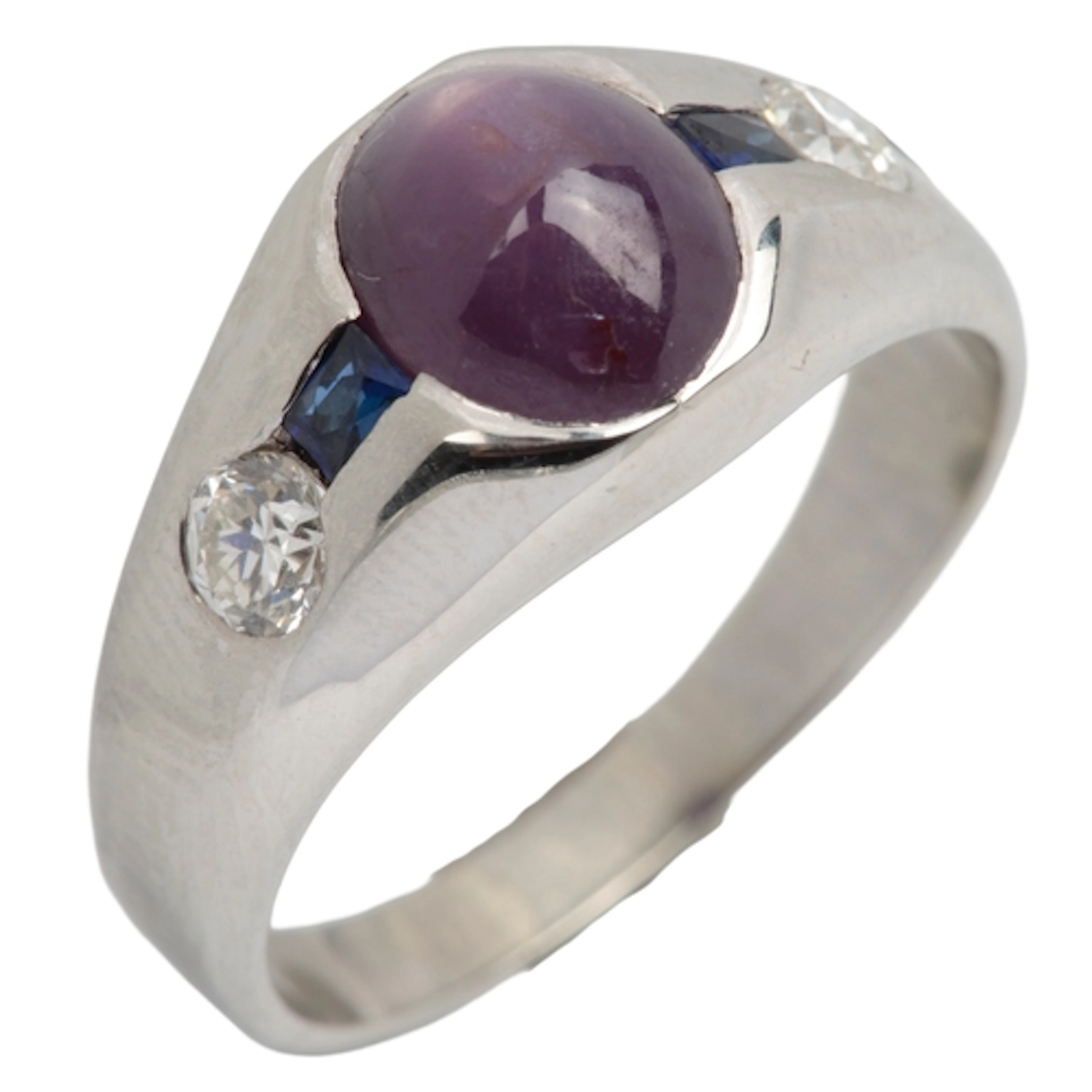 A star ruby, sapphire and diamond ring, mid 20th century, co...