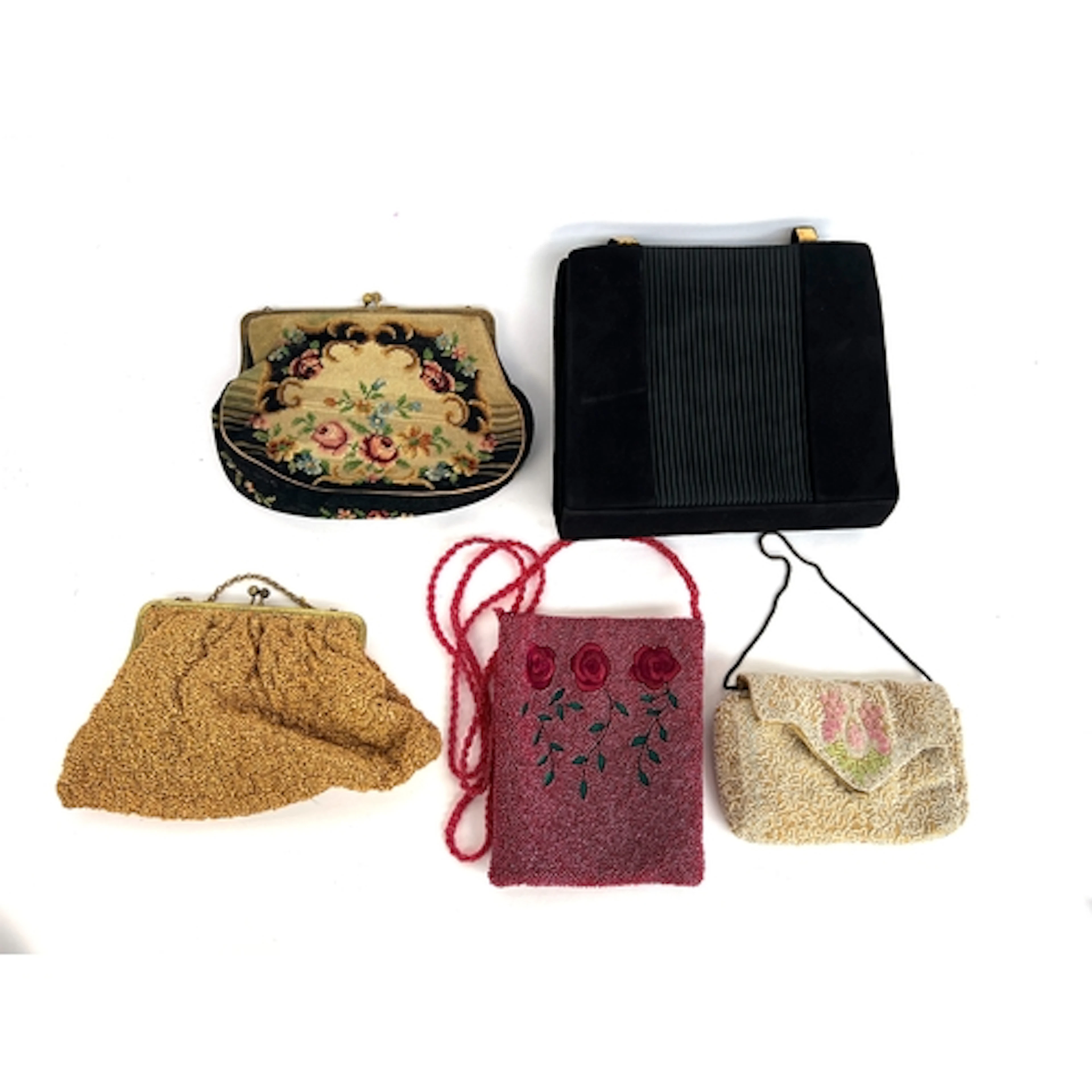 A collection of vintage bags and purses to include a black s...