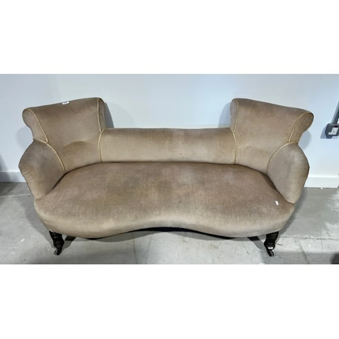 Twin backed parlour sofa upholstered in cream.