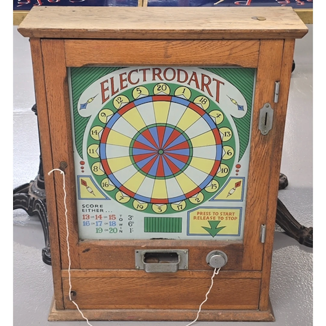 Electrodart vintage arcade machine on old 1D with keys.