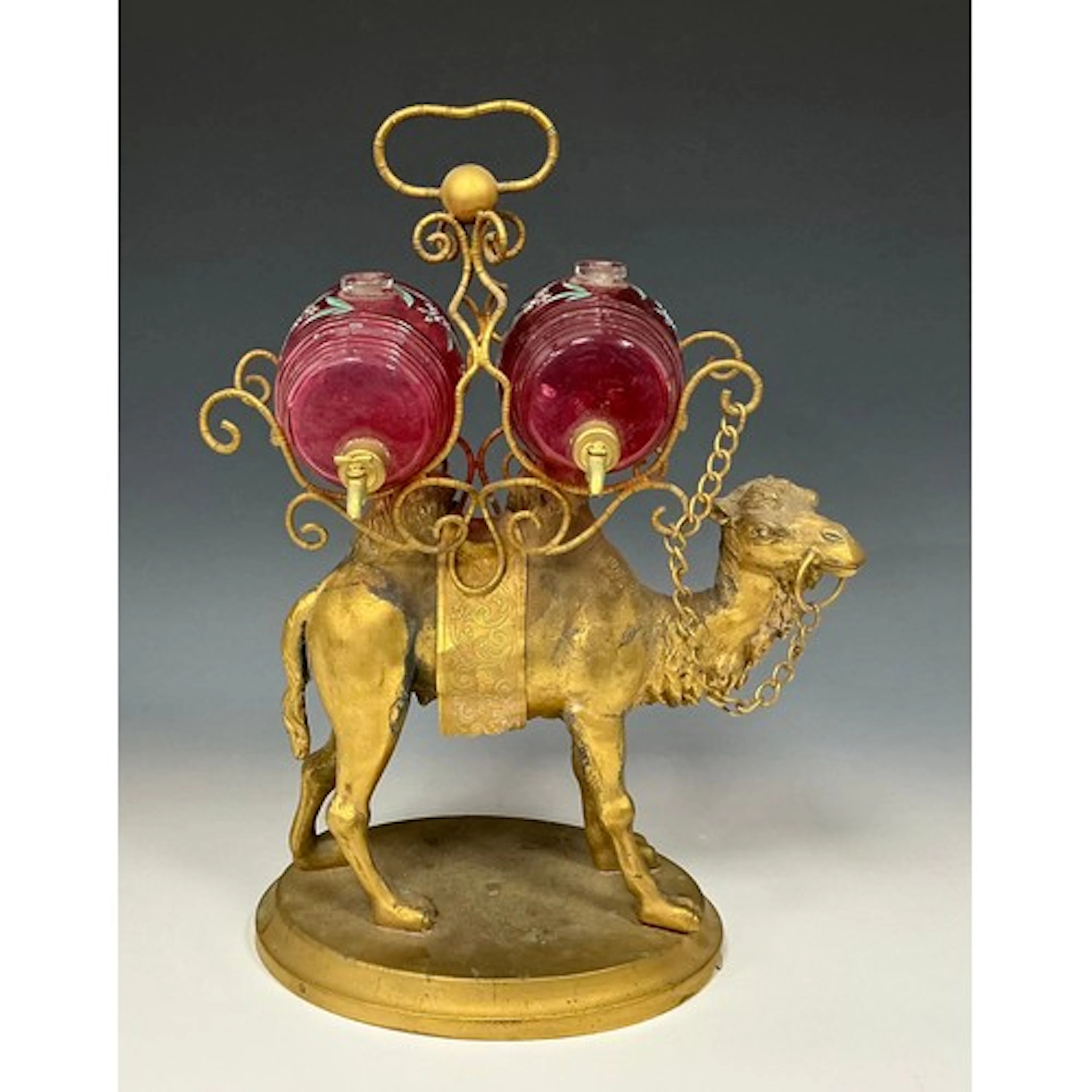 A 19th century Continental gilt metal novelty liqueur stand,...