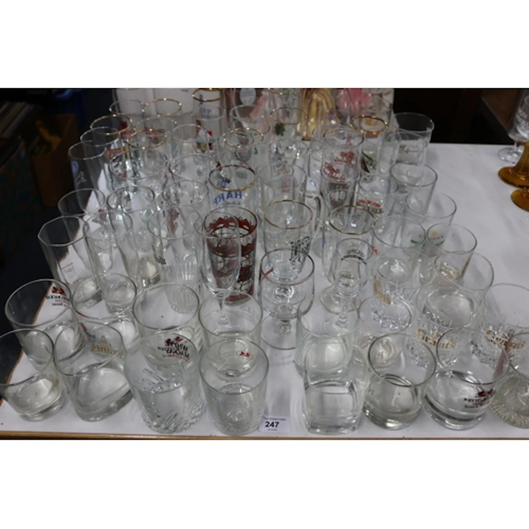 Branded glassware to include whisky tumblers, lager glasses ...